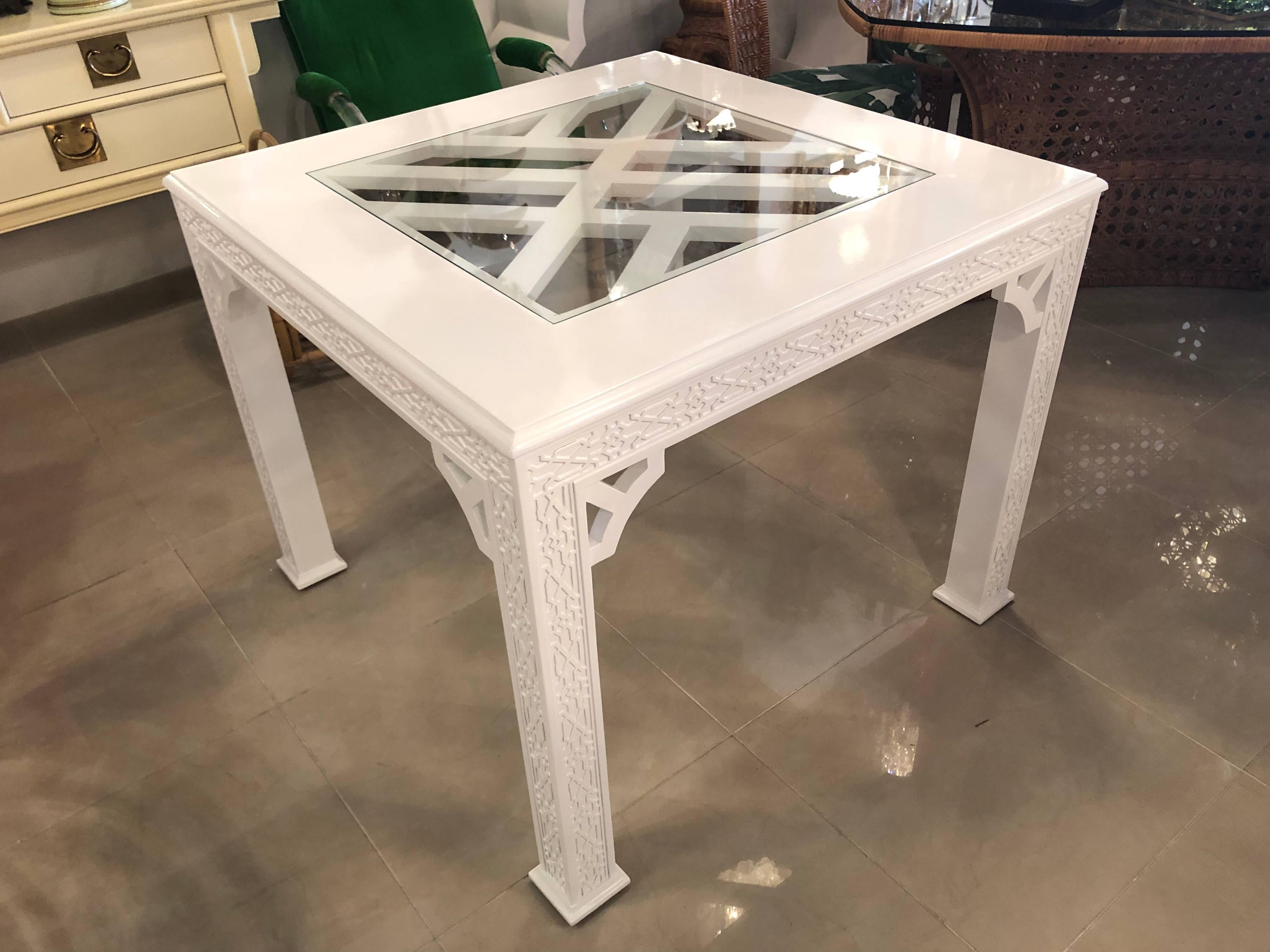 Vintage fretwork fret work Chinese Chippendale dining or game table with glass inset (new glass). Table has been newly professionally lacquered in a white gloss lacquer. Perfect Palm Beach piece!