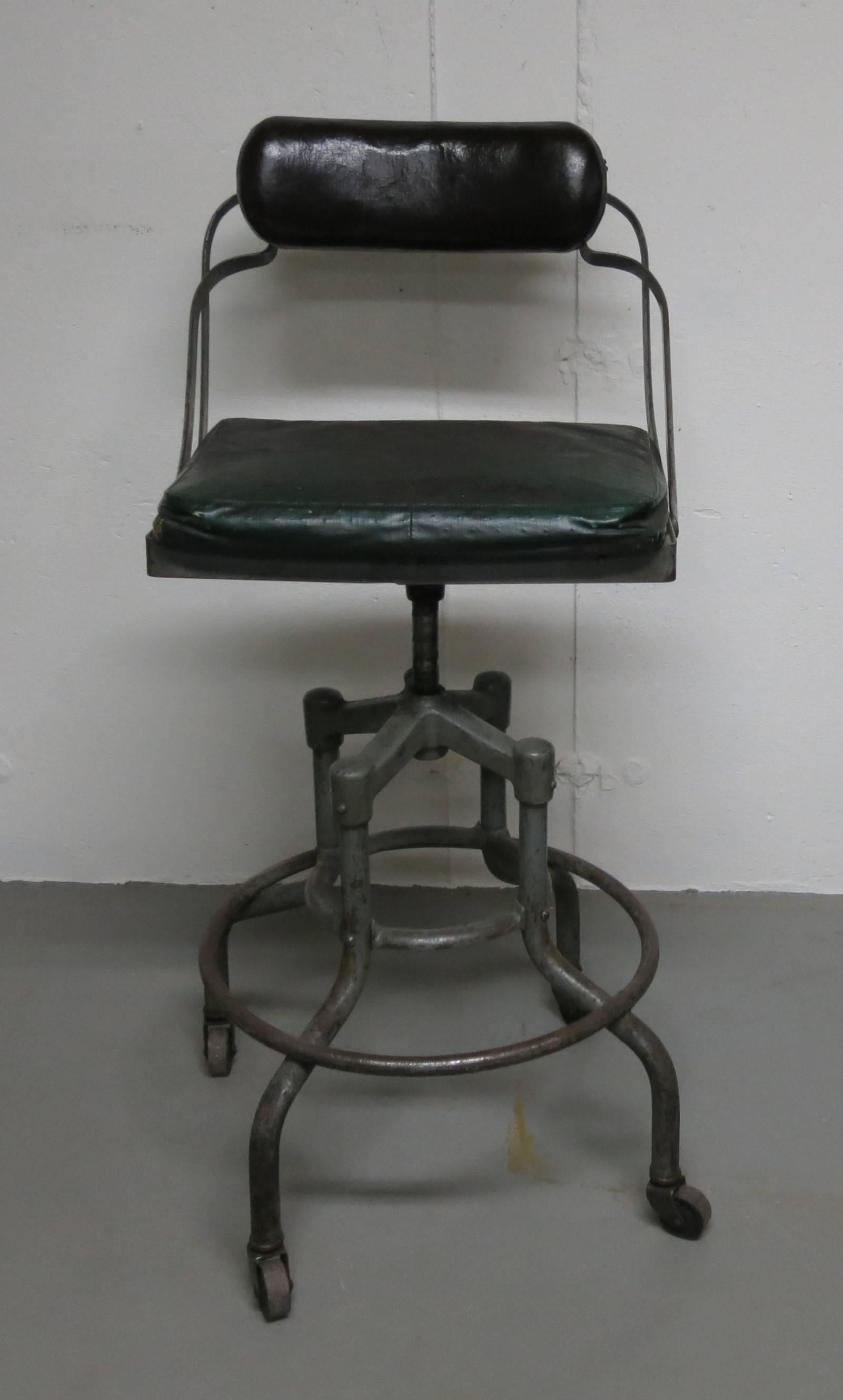 Nicely worn Fritz Cross Industrial chair or stool. Measure: The seat raises 25