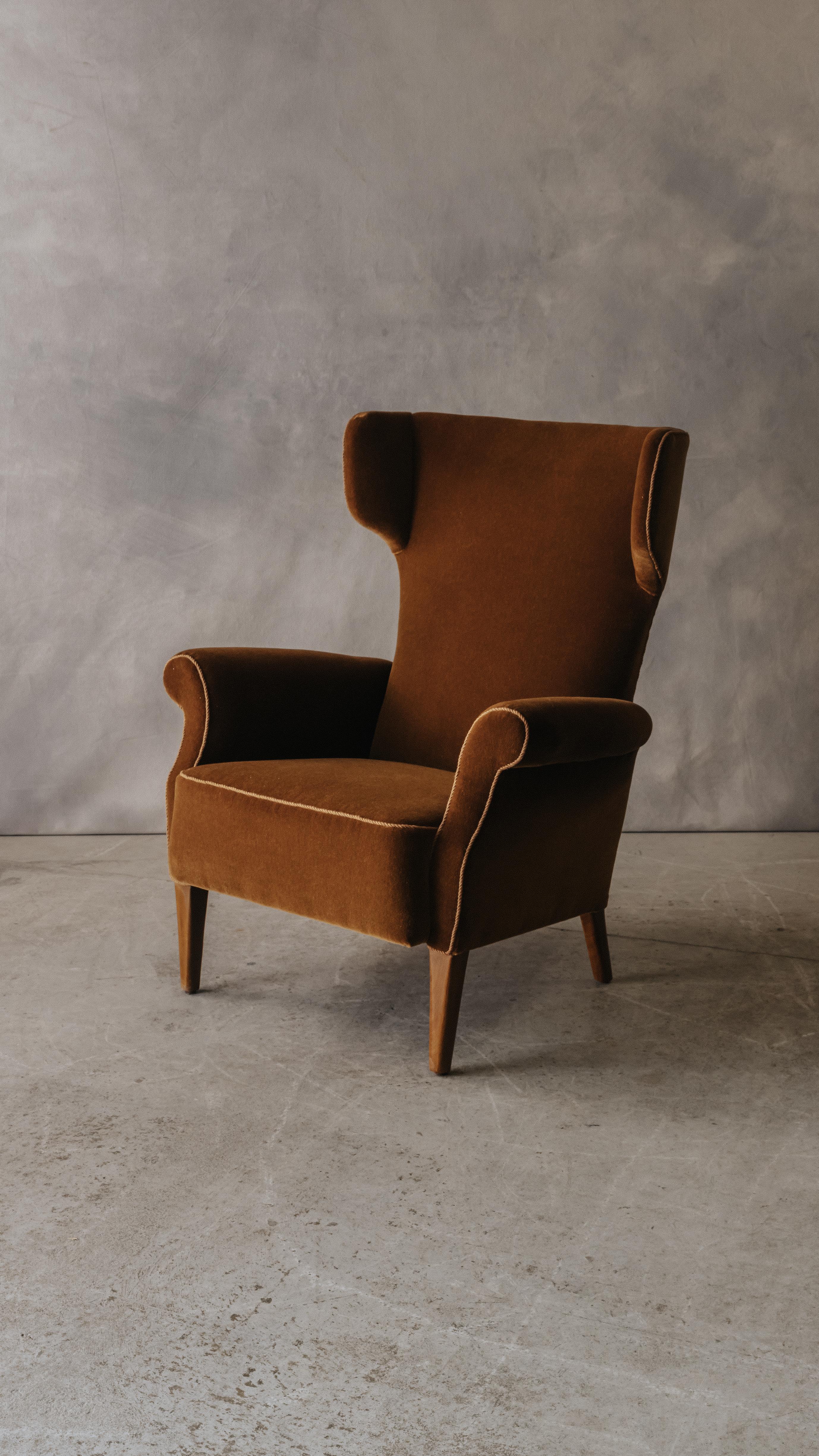 Vintage Fritz Hansen Lounge Chair From Denmark, Circa 1950.  Nice wingback model, later upholstered in a copper colored velvet mohair.