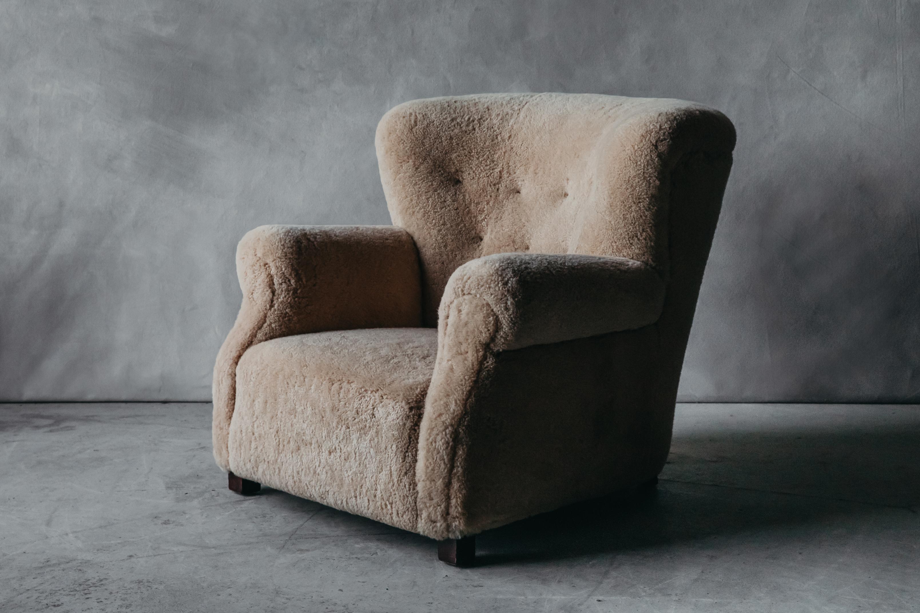 Vintage Fritz Hansen Lounge Chair In Shearling From Denmark, circa 1960. Large, comfortable model. Later upholstered in very soft, light honey color shearling.