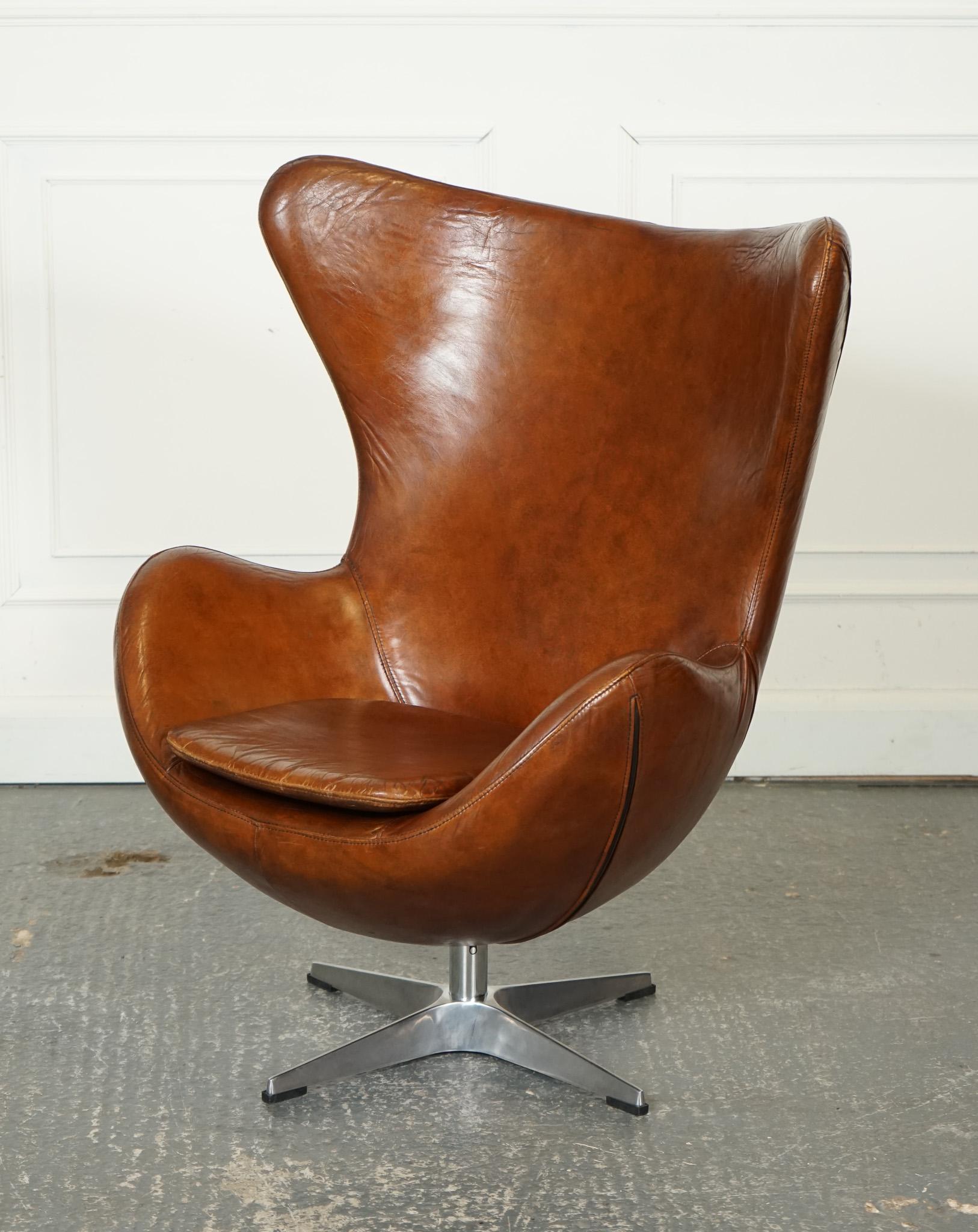 
We are delighted to offer for sale this Vintage Fritz Hansen Style Hand-dyed Brown Leather Egg Lounge Chair.

 An iconic and luxurious piece of furniture. Designed after famed Danish designer Arne Jacobsen in 1958, the Egg Chair features a unique