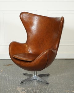 sedia da salotto in pelle marrone tinta a mano in stile vintage di Hansen.