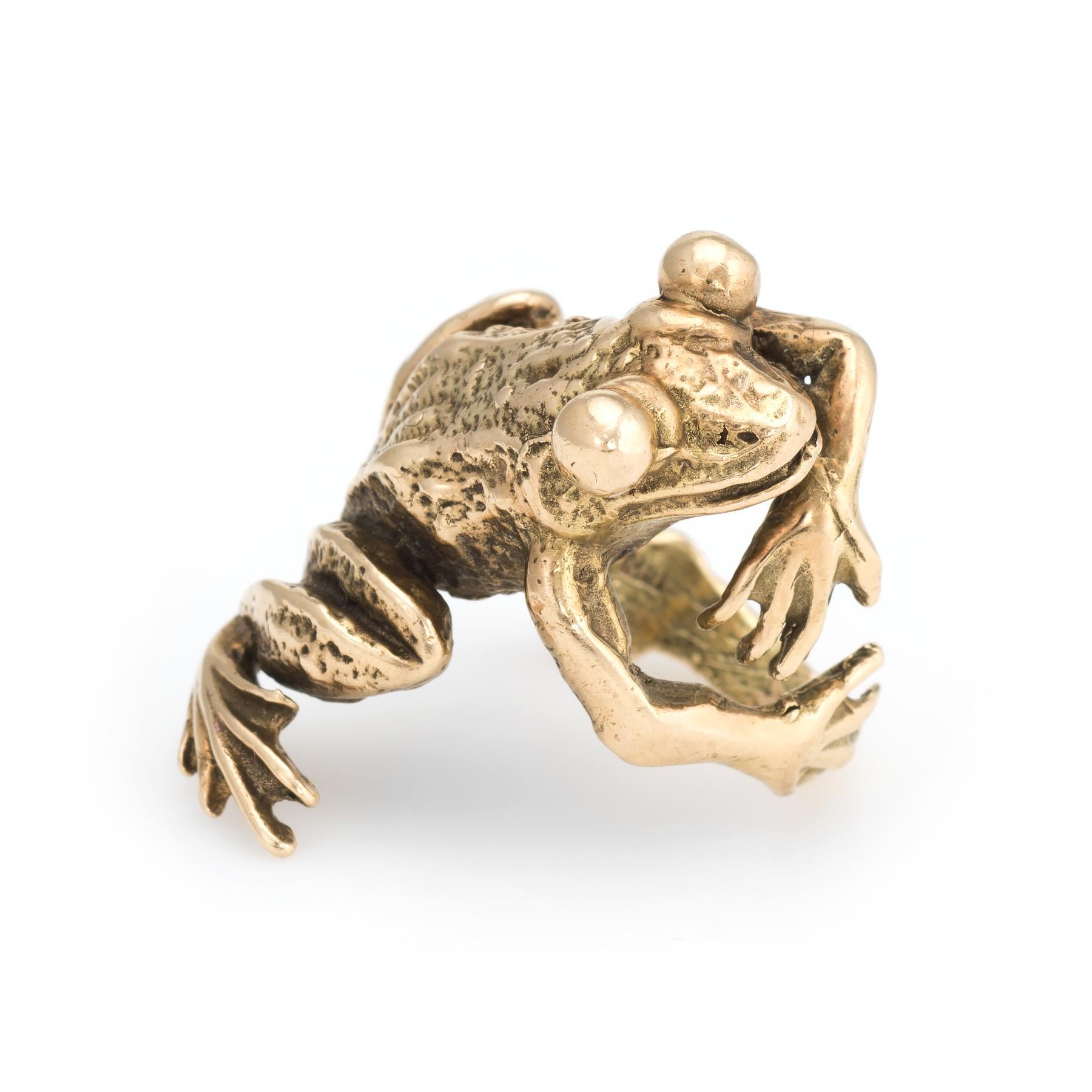 Finely detailed vintage frog cocktail ring (circa 1960s to 1970s), crafted in 14 karat yellow gold. 

The distinct and charming frog is designed to hug the finger. The arms and legs casually wrap around the finger for a comfortable fit. The froggie