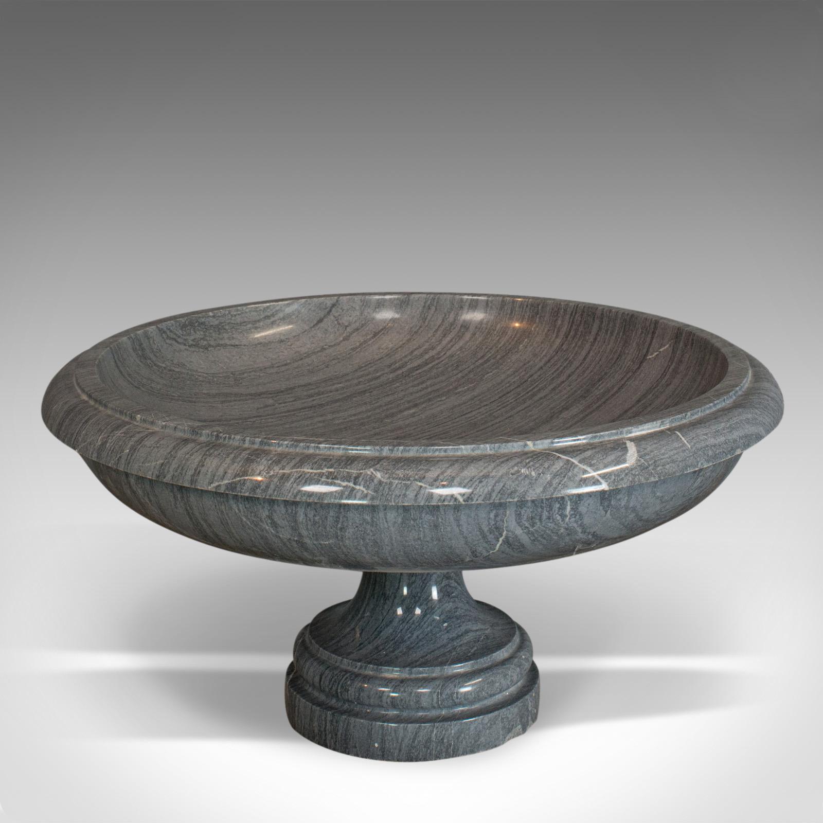 This is a vintage fruit bowl. An English, platinum striata marble ornamental serving dish, dating to the late 20th century.

Elegant dish with stunning marble veins
Displays a desirable aged patina
Eye-catching dark grey marble
