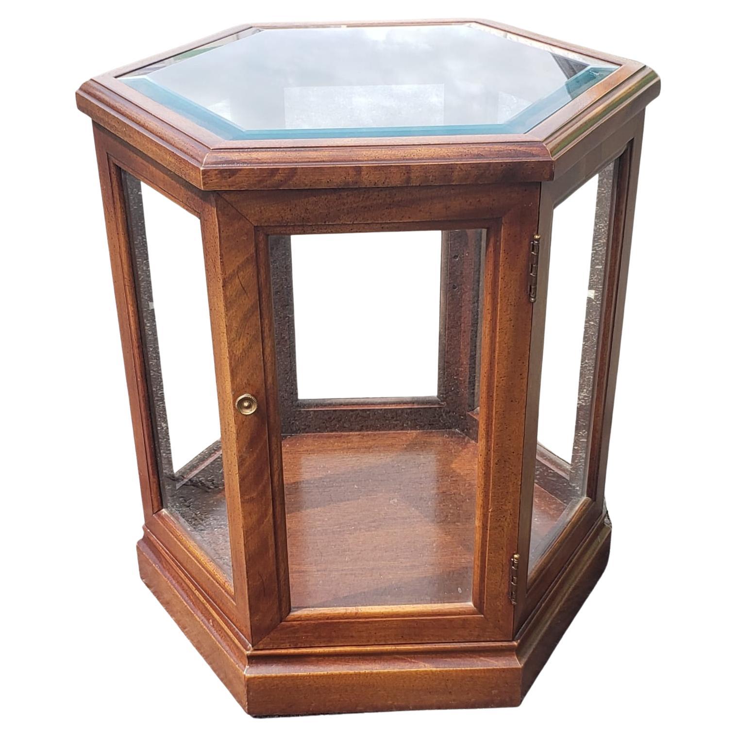A Vintage Fruitwood and Glass Paneled Hexagonal Side Table in great vintage consdition.  Measures 21.5