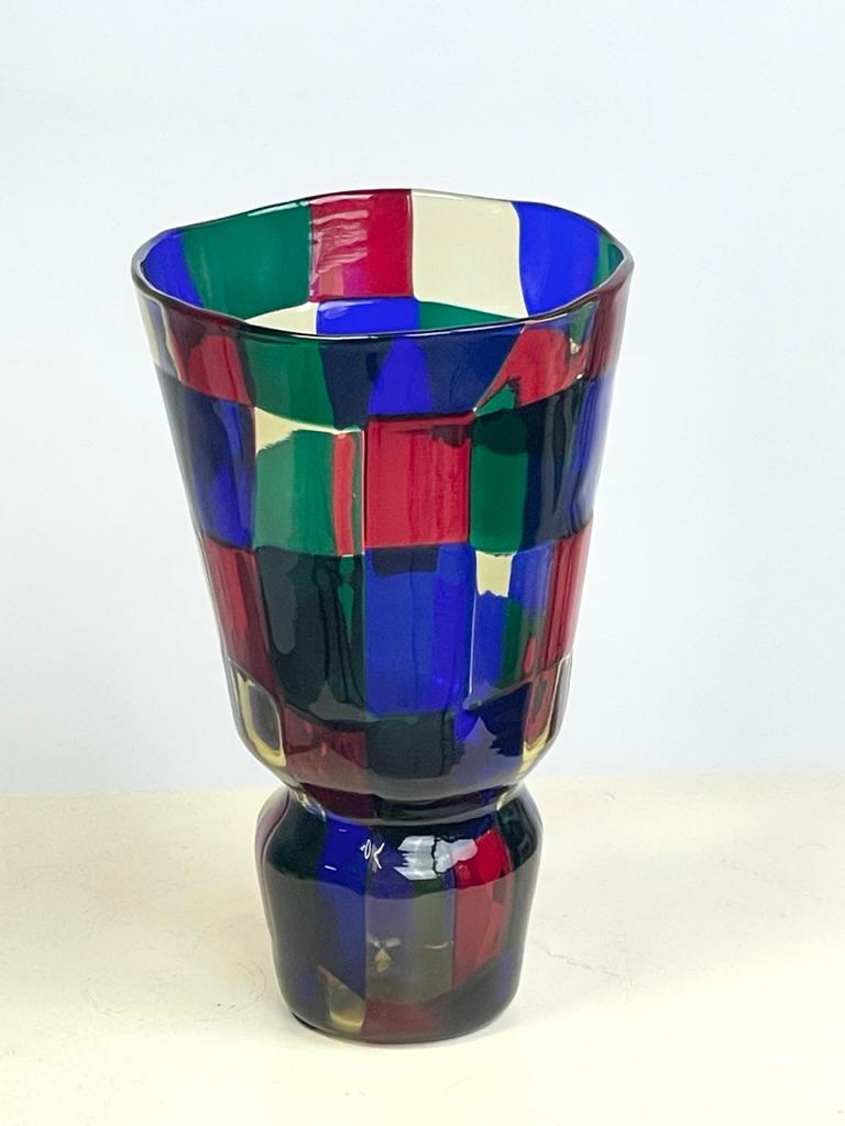  'Paris' colorway of red, blue, green, and hay yellow glass. One of Bianconi's major contributions to the art of glassmaking, the Pezzato series premiered at the 1950 Venice Biennale where it won top honors in its area. The extreme difficulty of