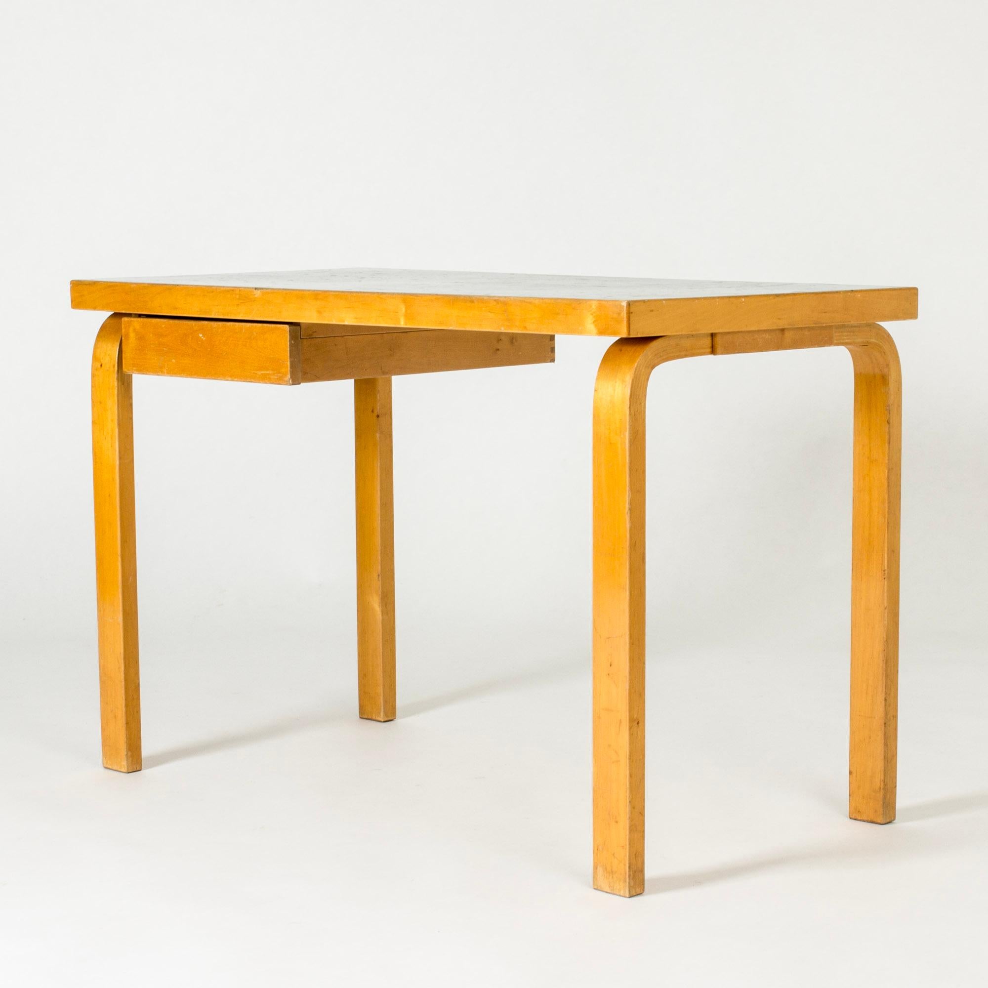 Desk by Alvar Aalto made from birch with original green top. Lovely, clean lines. Neat size, small drawer to the left.