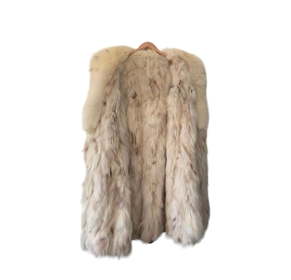 Abrigo de piel vintage Piel de ante marrón con forro y cuello de piel de lince de nutria Marrón en venta