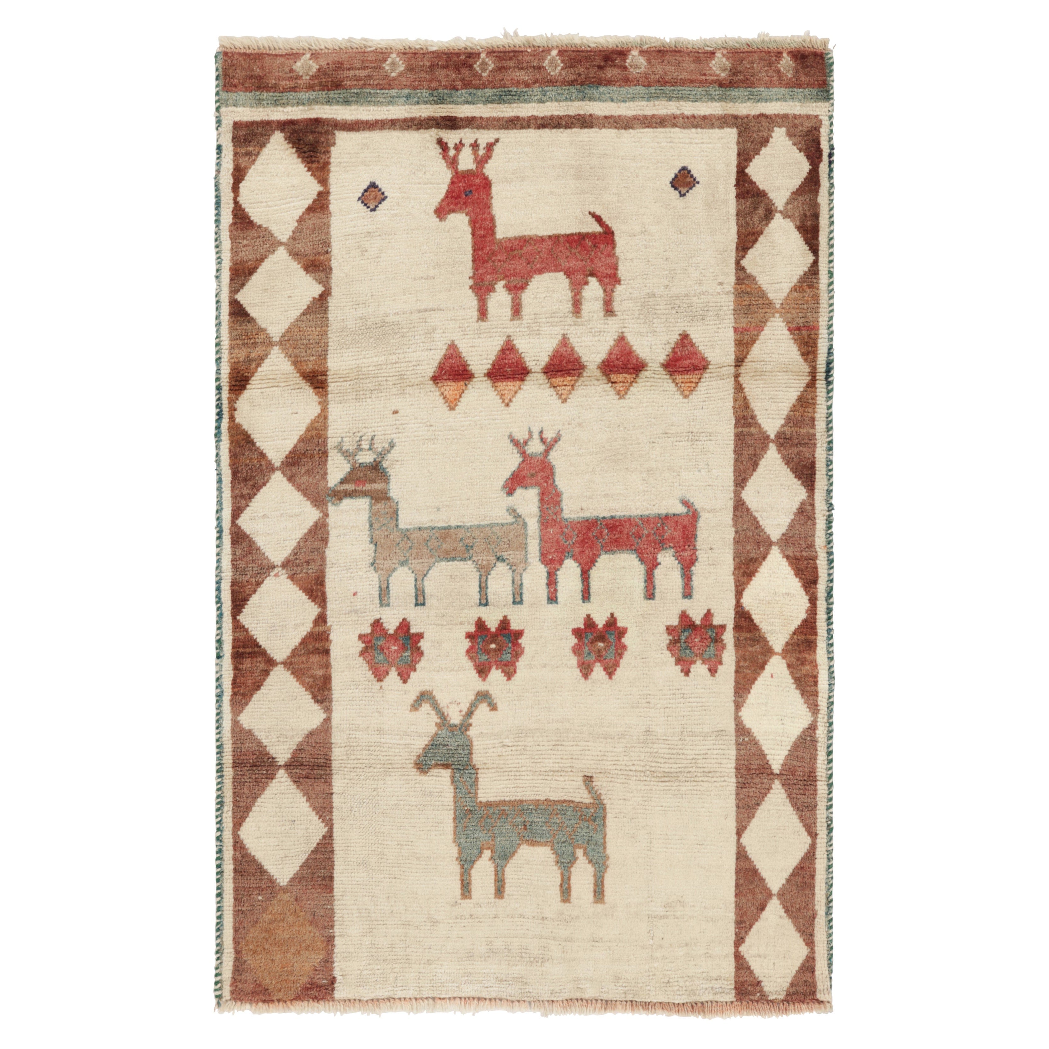 Tappeto persiano Gabbeh vintage, beige con immagini di animali colorati - Rug & Kilim