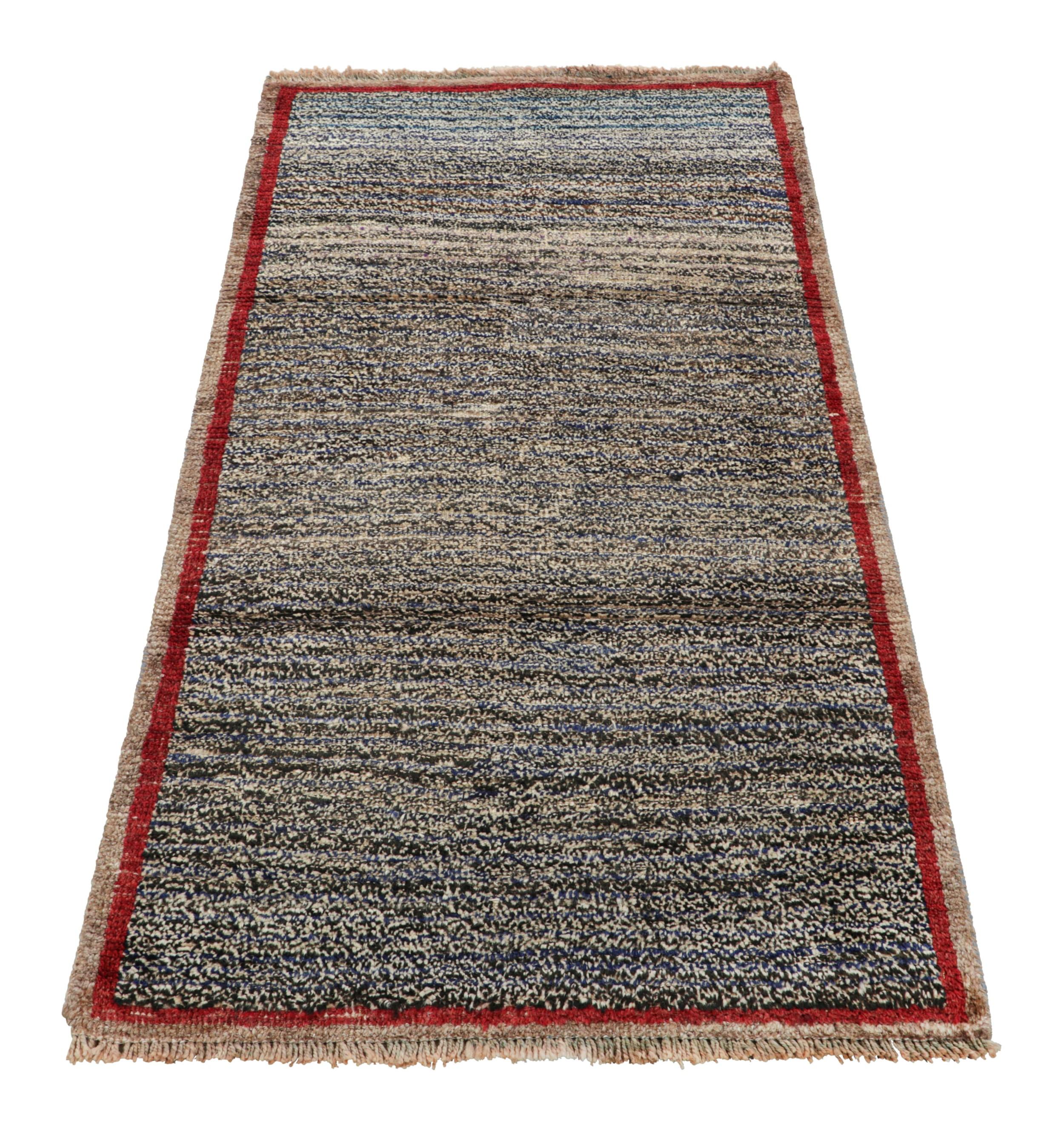 Alfombra persa Gabbeh vintage en tonos negro, índigo y crema - Rug & Kilim Anudado a mano en venta