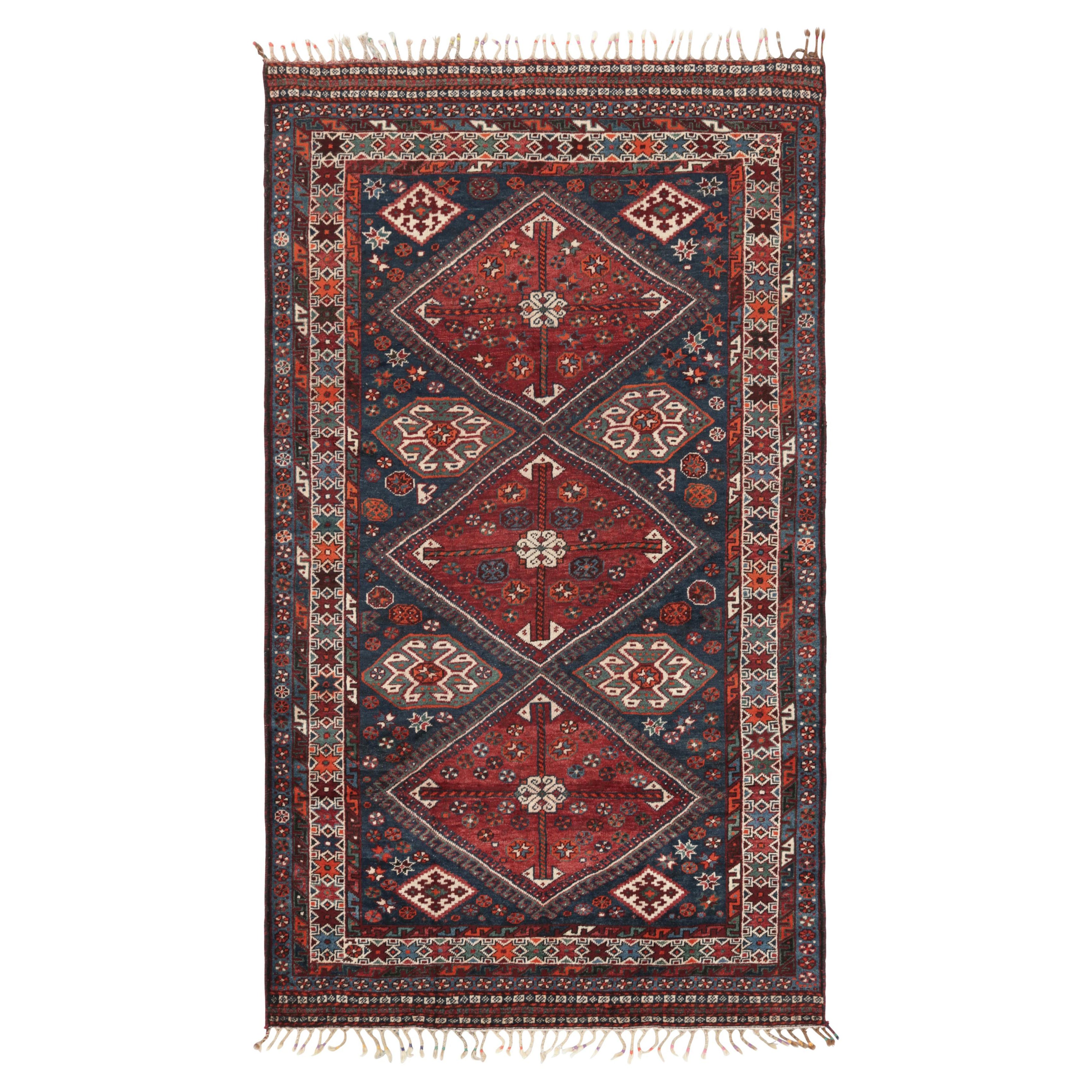 Tappeto persiano Gabbeh vintage con medaglioni geometrici blu e rossi - Rug & Kilim