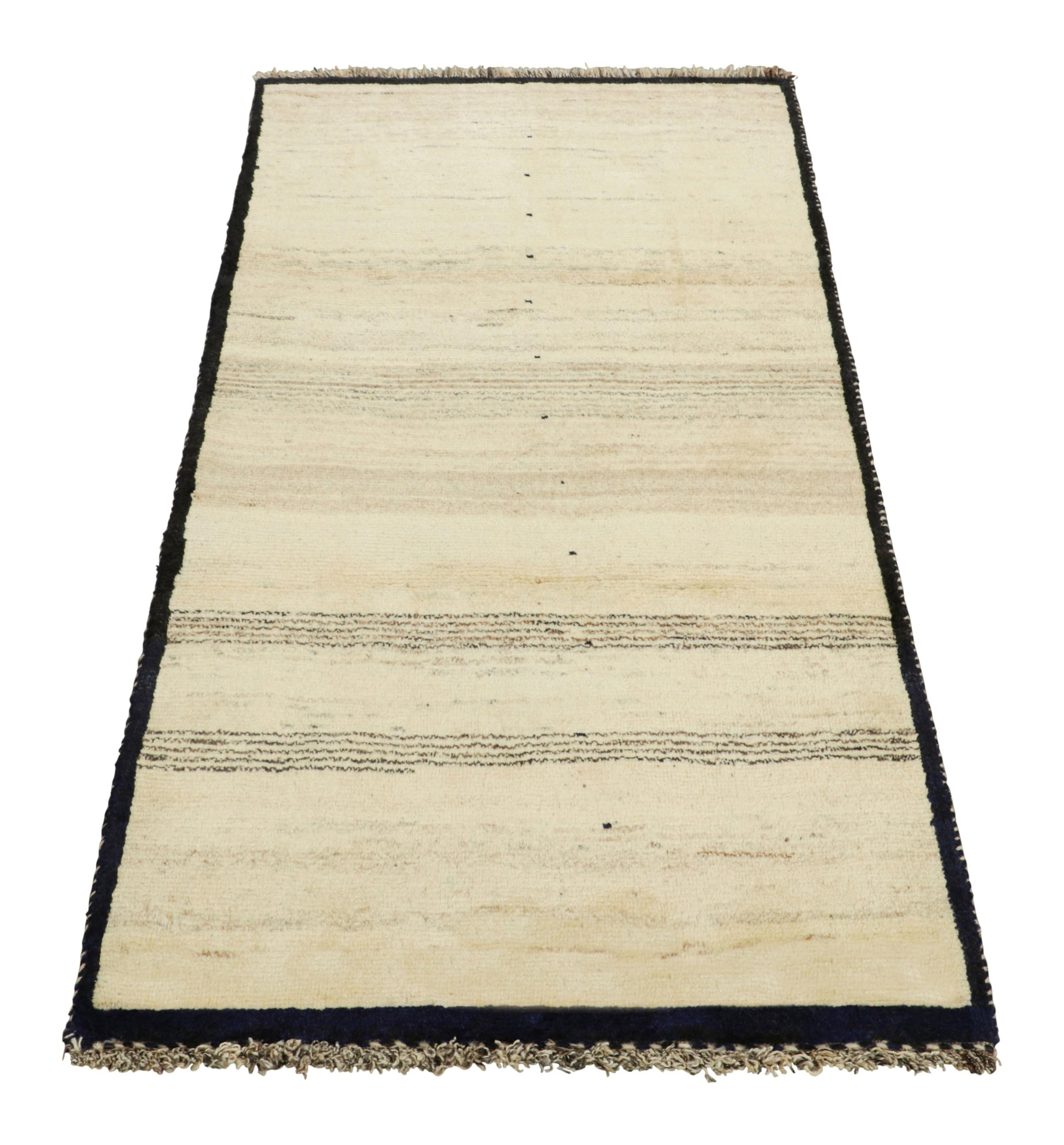 Alfombra persa vintage Gabbeh en tonos negros y crema - Rug & Kilim Anudado a mano en venta
