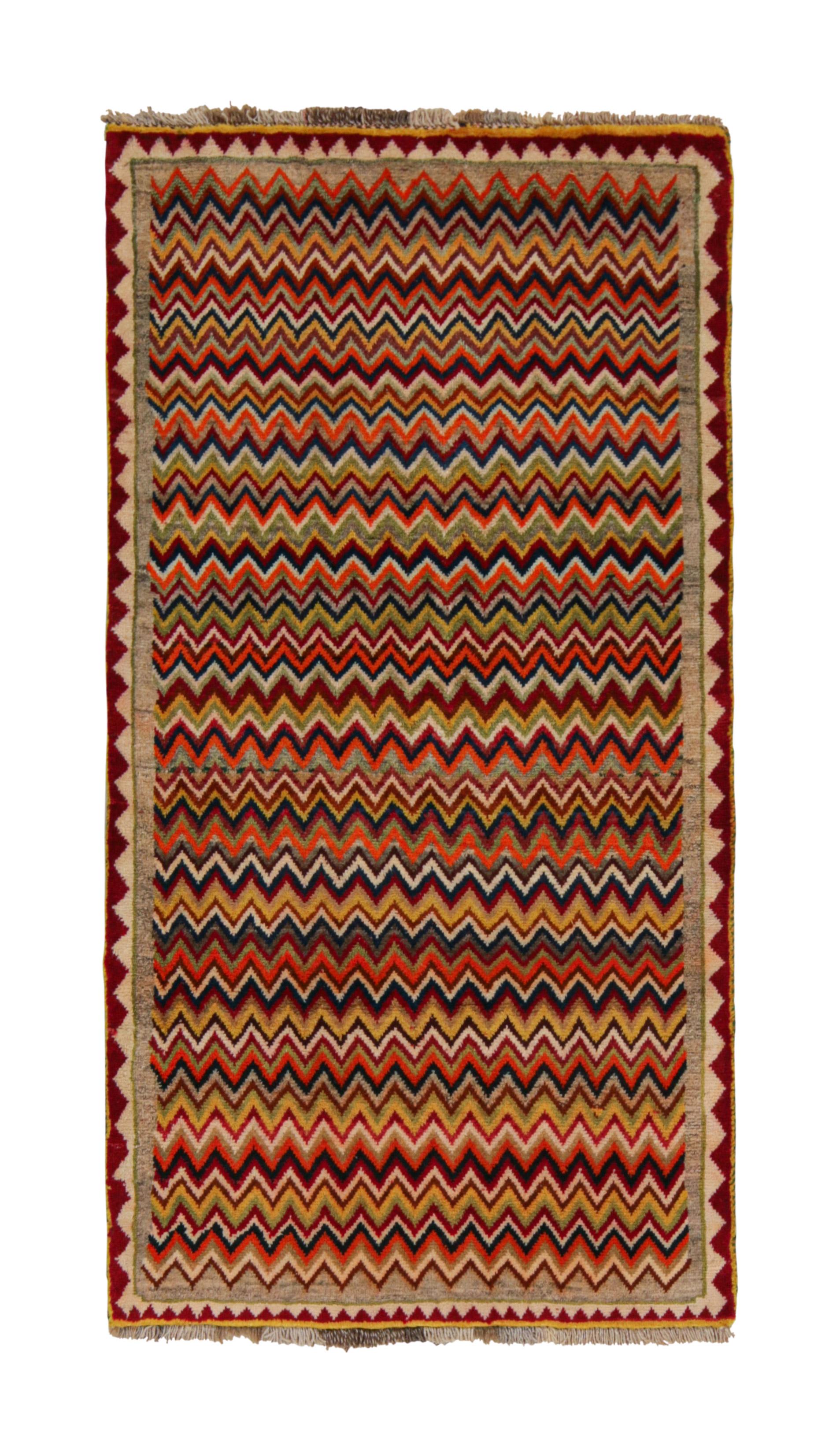 This vintage 4x7 Gabbeh Persian rug is from the latest entries in Rug & Kilim’s rare tribal curations. Hand-knotted in wool circa 1950-1960.

On the Design:

This tribal provenance is one of the most primitive, and collectible shabby-chic styles