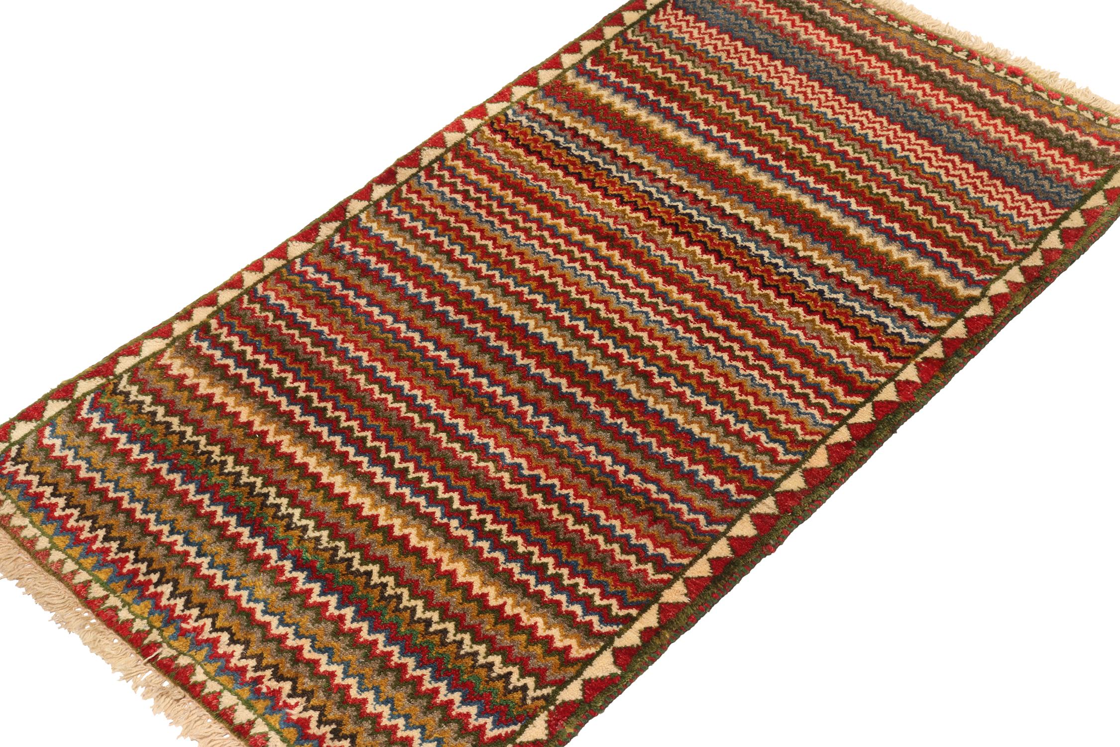 This vintage 2x4 Gabbeh Persian rug is from the latest entries in Rug & Kilim’s rare tribal curations. Hand-knotted in wool circa 1950-1960.

On the Design:

This tribal provenance is one of the most primitive, and collectible shabby-chic styles