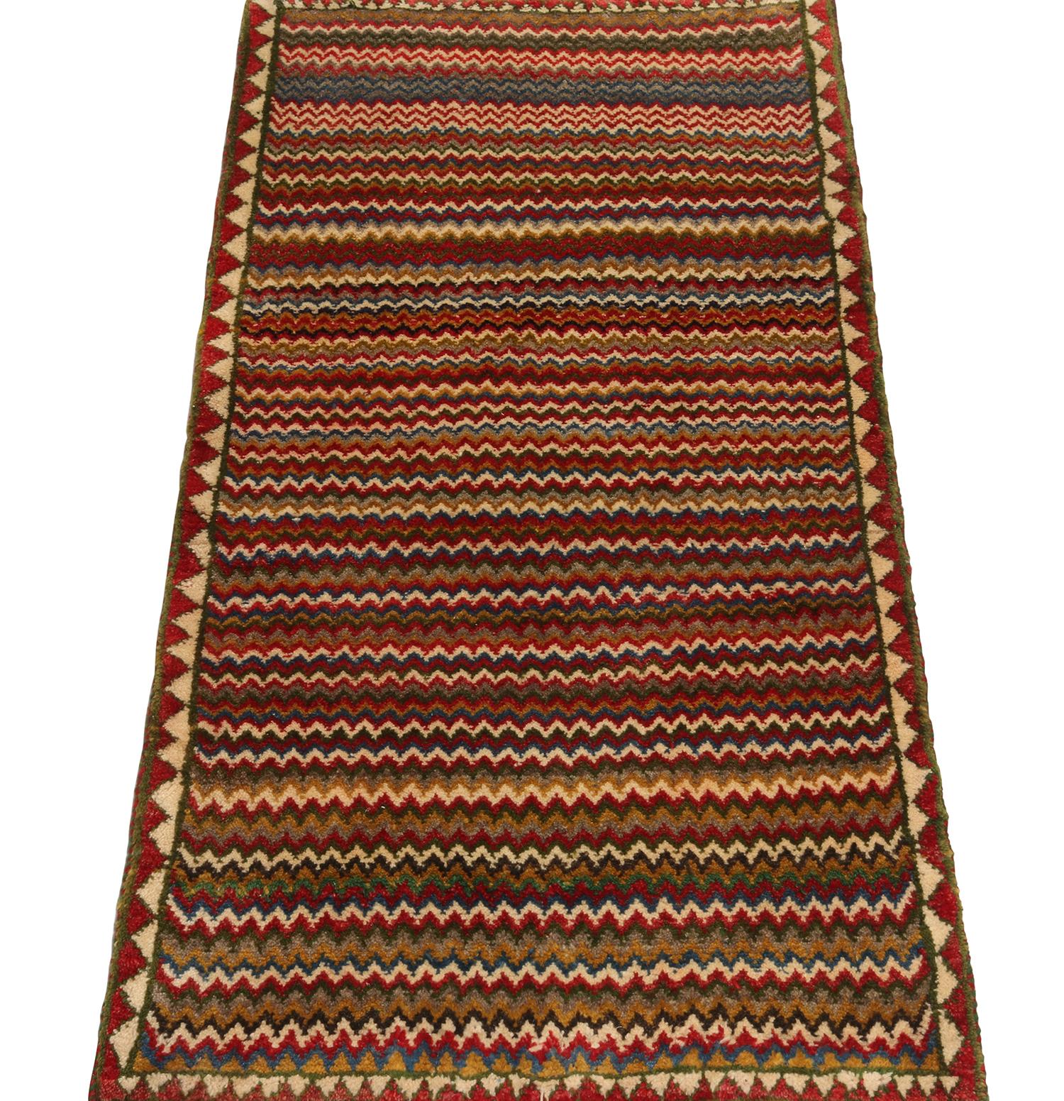 Turkish Vintage Gabbeh Persian Tribal Rug in Vibrant Chevron Patterns by Rug & Kilim For Sale