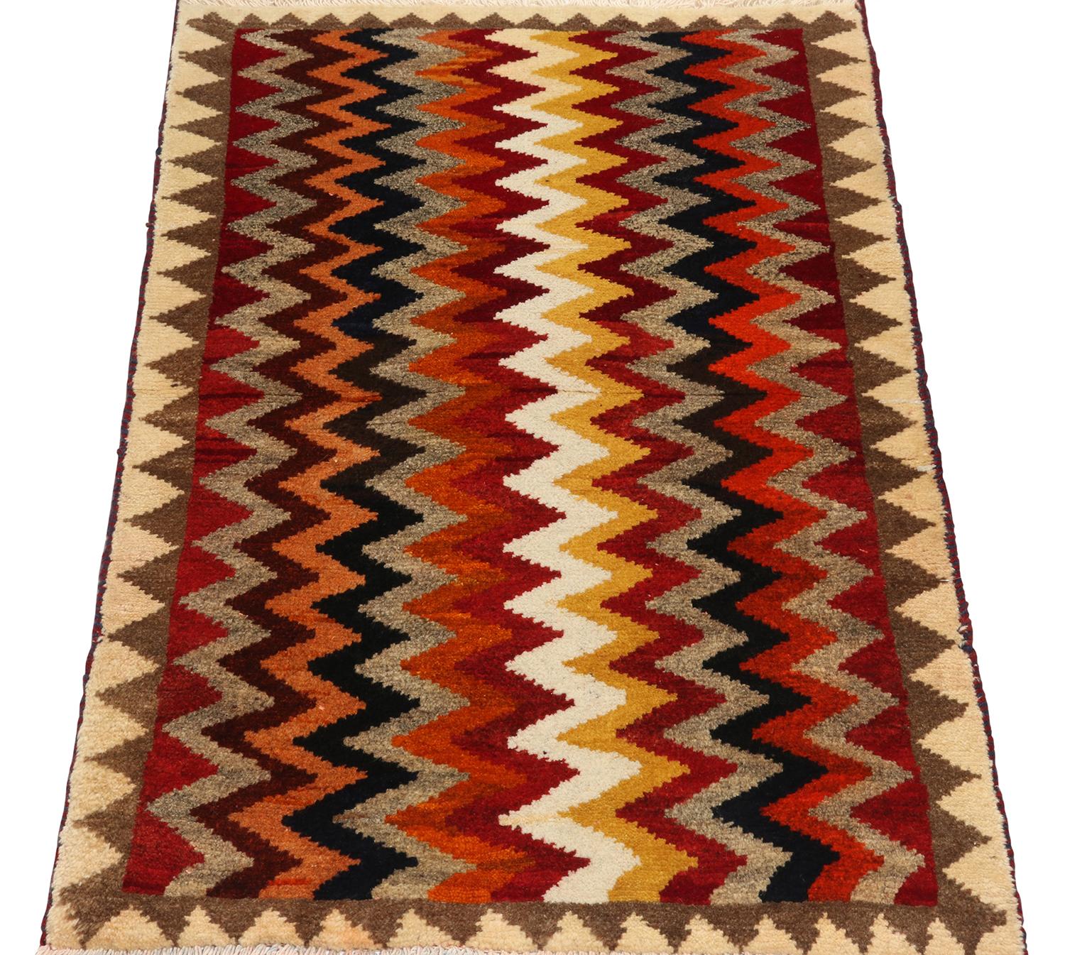 Turkish Vintage Gabbeh Persian Tribal Rug in Vibrant Chevron Patterns by Rug & Kilim For Sale