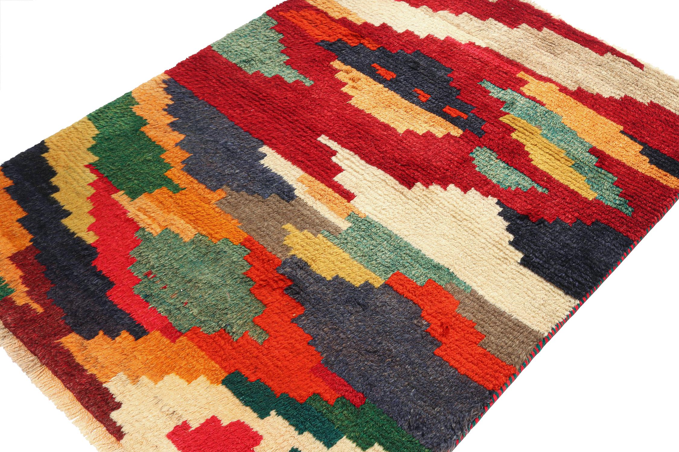 This vintage 4x5 Gabbeh Persian rug is from the latest entries in Rug & Kilim’s rare tribal curations. Hand-knotted in wool circa 1950-1960.

On the Design:

This tribal provenance is one of the most primitive, and collectible shabby-chic styles