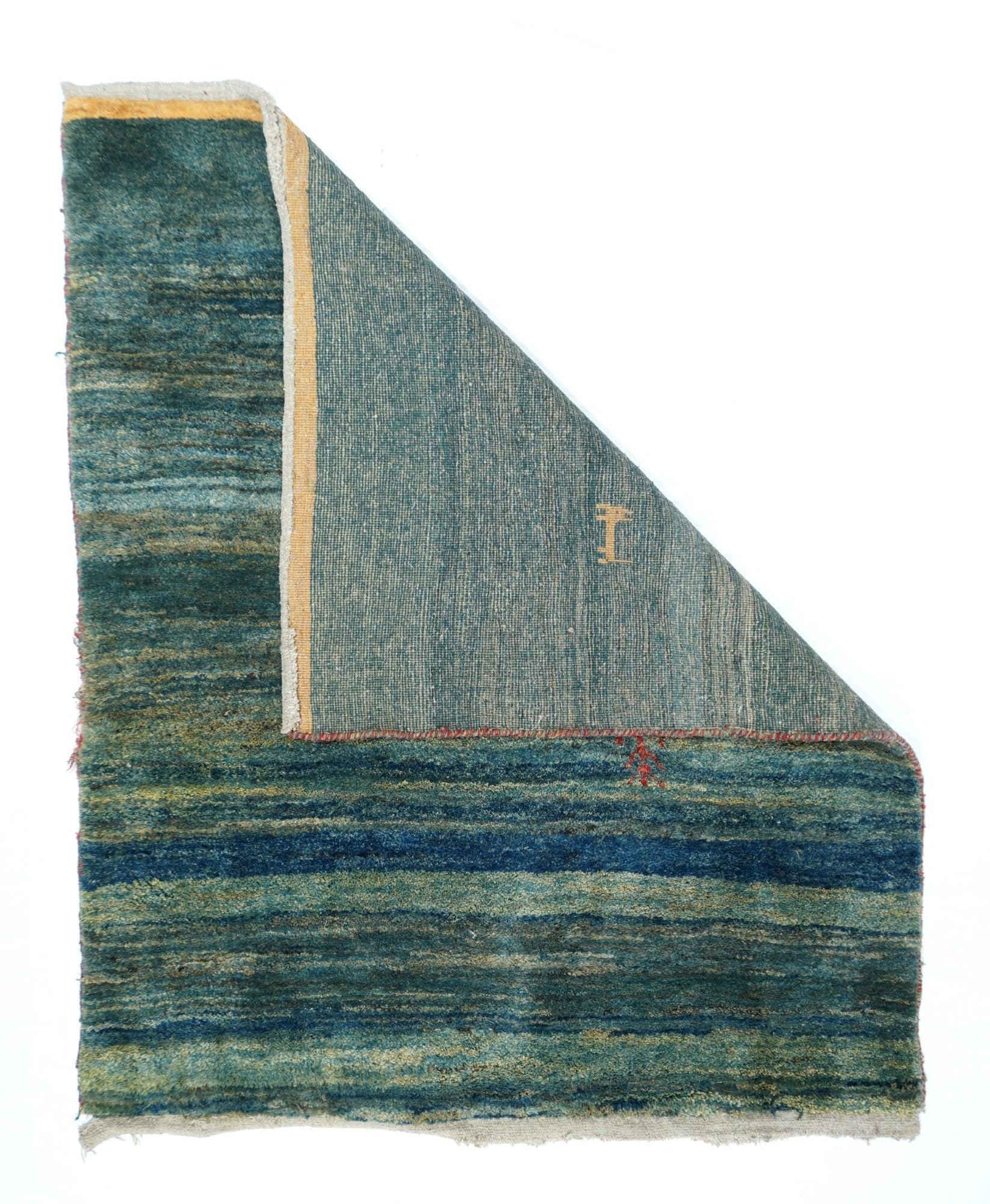 Vintage Gabbeh Rug 5'11'' x 5'11''. This charmingly na•ve SW Persian tribal scatter shows a borderless, heavily abrashed teal field with two small ecru quadrupeds. The abrash varies from eggshell to denim to pale blue to teal green. No borders, but