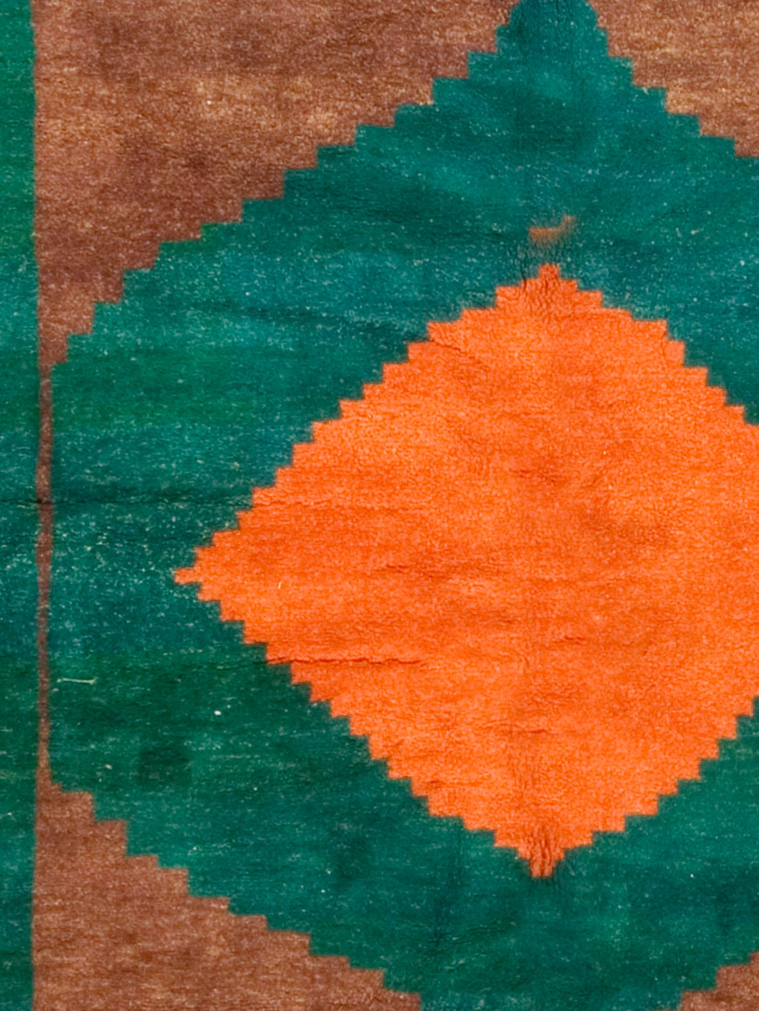 Vintage Gabbeh Rug 6'5 X 7'2. Gabbeh rugs in colorful, totally abstract styles, are a recent innovation and one of the best things to happen to the oriental rug in a long time. What can be bolder than a plain orange diamond medallion set on an