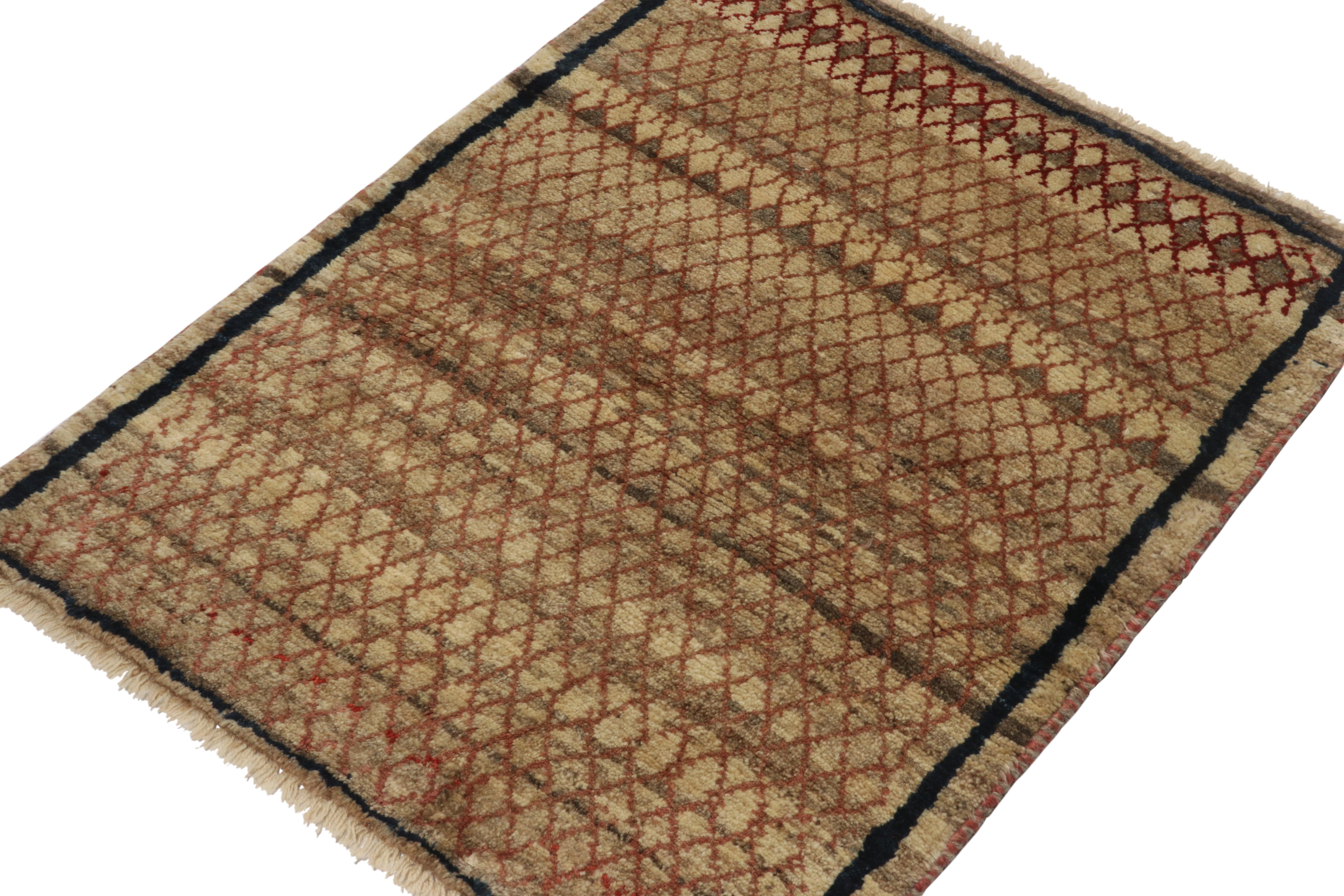 A vintage 2x3 Persian Gabbeh rug in the latest additions to Rug & Kilim’s curation of rare tribal pieces. Hand-knotted in wool circa 1950-1960.

On the Design: 

This mid-century piece features an elaborate trellis pattern with rust red notes