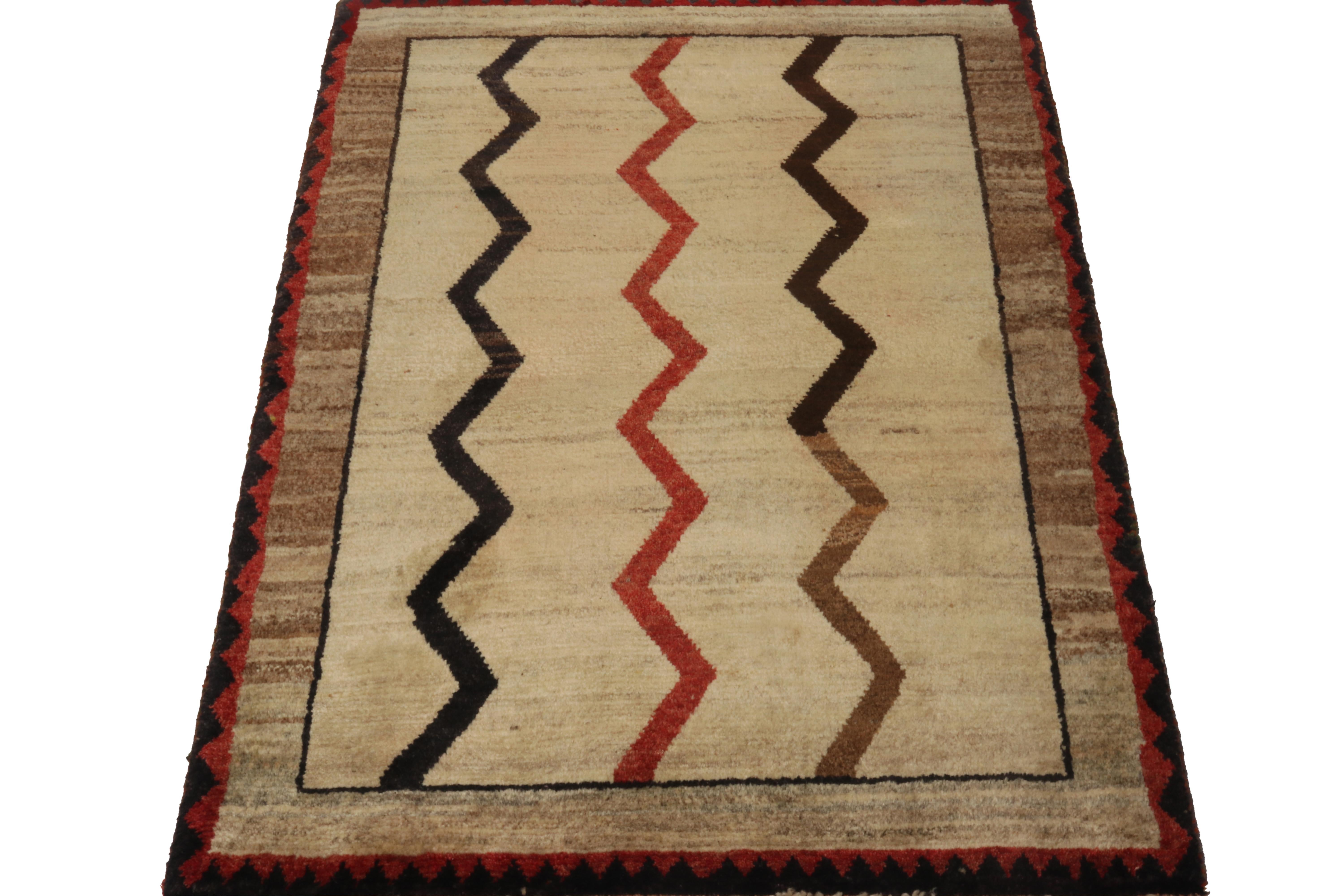 A vintage 3x4 Persian Gabbeh rug in the latest entries to Rug & Kilim’s curation of rare tribal pieces. Hand-knotted in wool circa 1950-1960.

On the Design:

This pattern enjoys chevrons in red & black with a bold, vibrant presenct