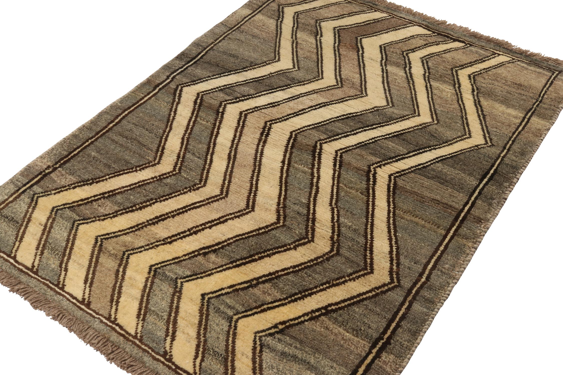 A vintage 4x7 Persian Gabbeh rug in the latest entries to Rug & Kilim’s curation of rare tribal pieces. Hand-knotted in wool circa 1950-1960.
On the design:
This pattern enjoys chevrons in beige-brown on a gorgeous and abrashed gray background.
