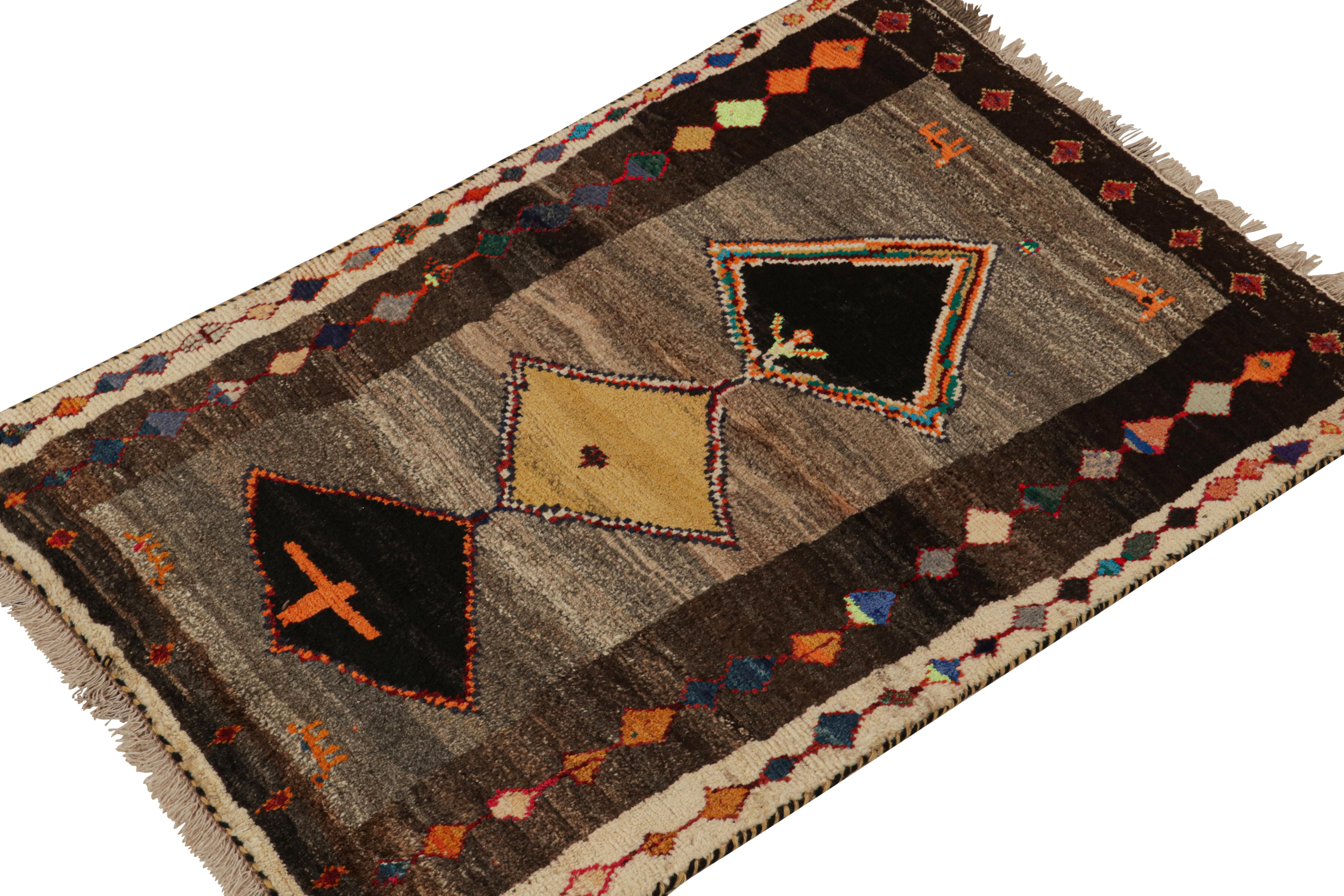 This vintage 4x5 Gabbeh Persian rug is from the latest entries in Rug & Kilim’s rare tribal curations. Hand-knotted in wool circa 1950-1960.

On the Design:
This tribal provenance is one of the most primitive, and collectible shabby-chic styles