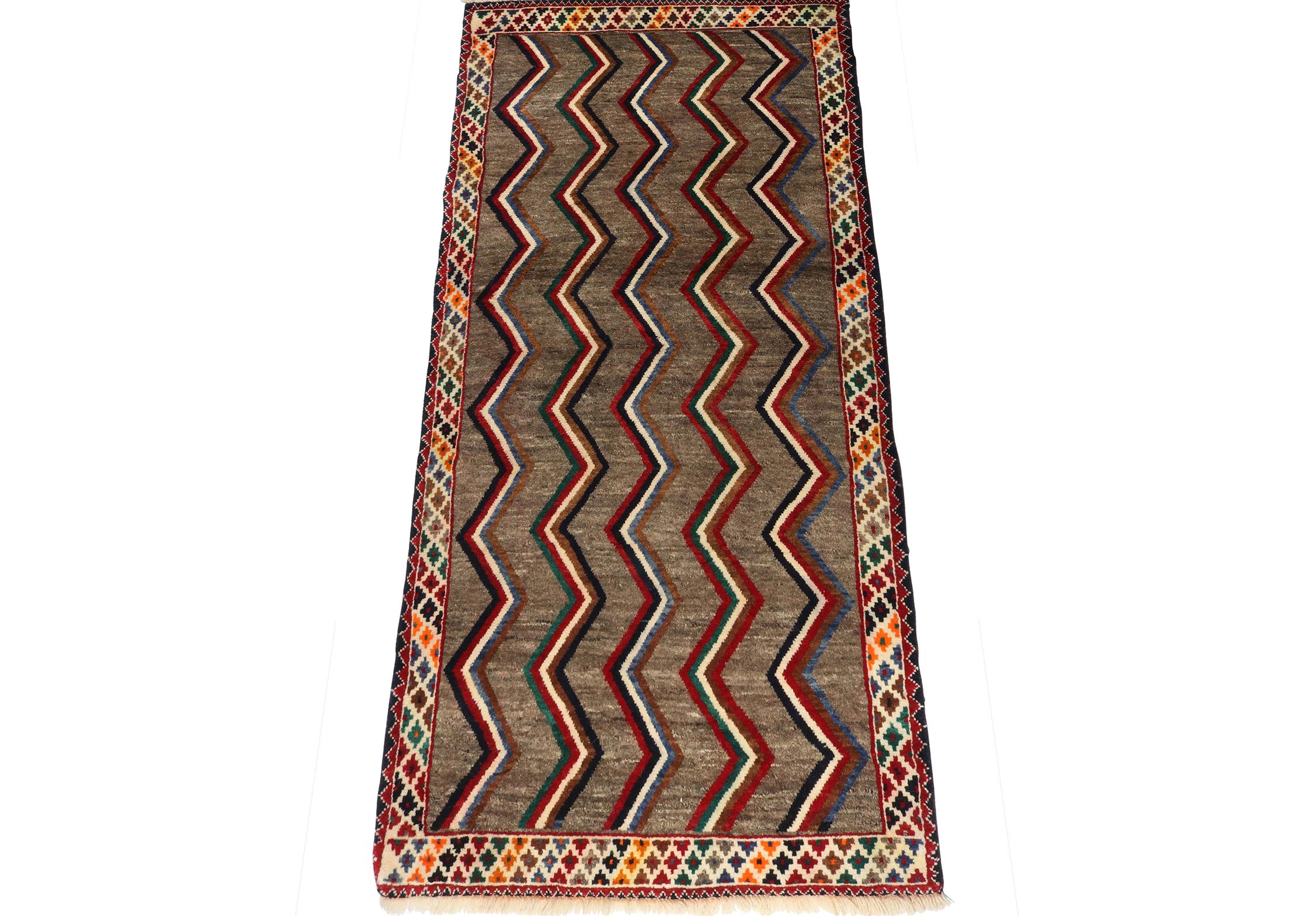 Tribal Vintage Gabbeh Runner in Brown with Vibrant Chevron Pattern by Rug & Kilim For Sale