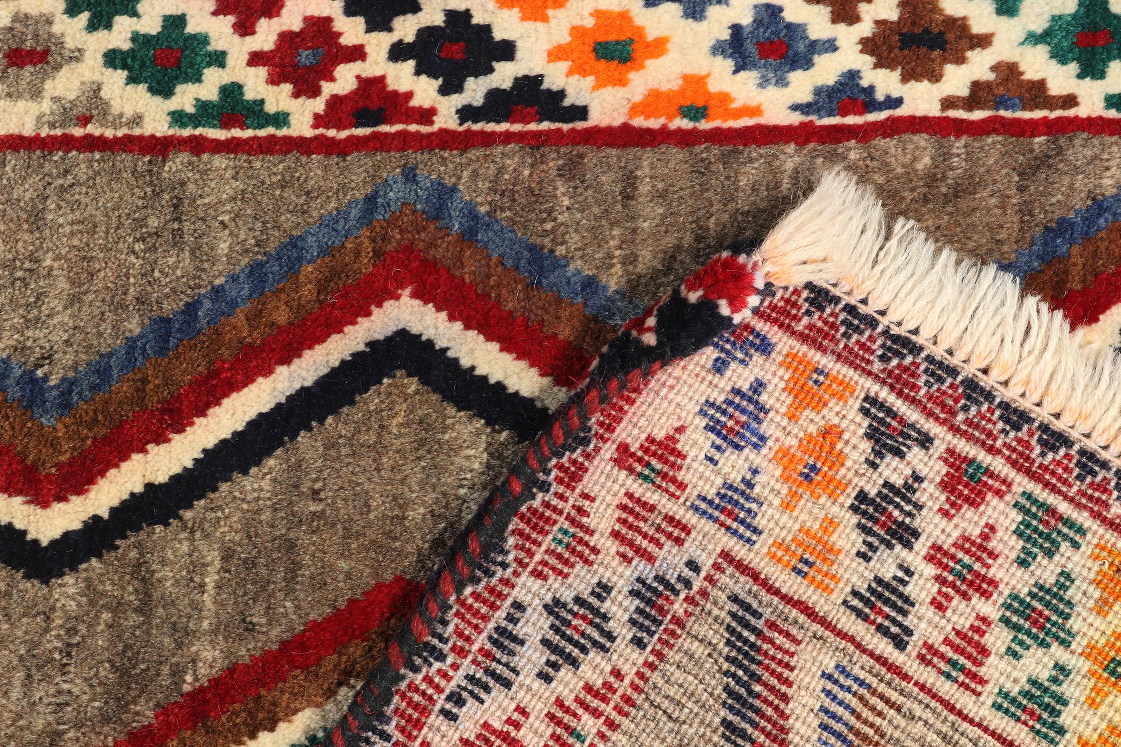 Mid-20th Century Vintage Gabbeh Runner in Brown with Vibrant Chevron Pattern by Rug & Kilim For Sale