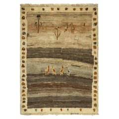 Gabbeh Tribal-Teppich im Vintage-Stil mit beige-braunen und goldenen Motiven von Teppich & Kelim