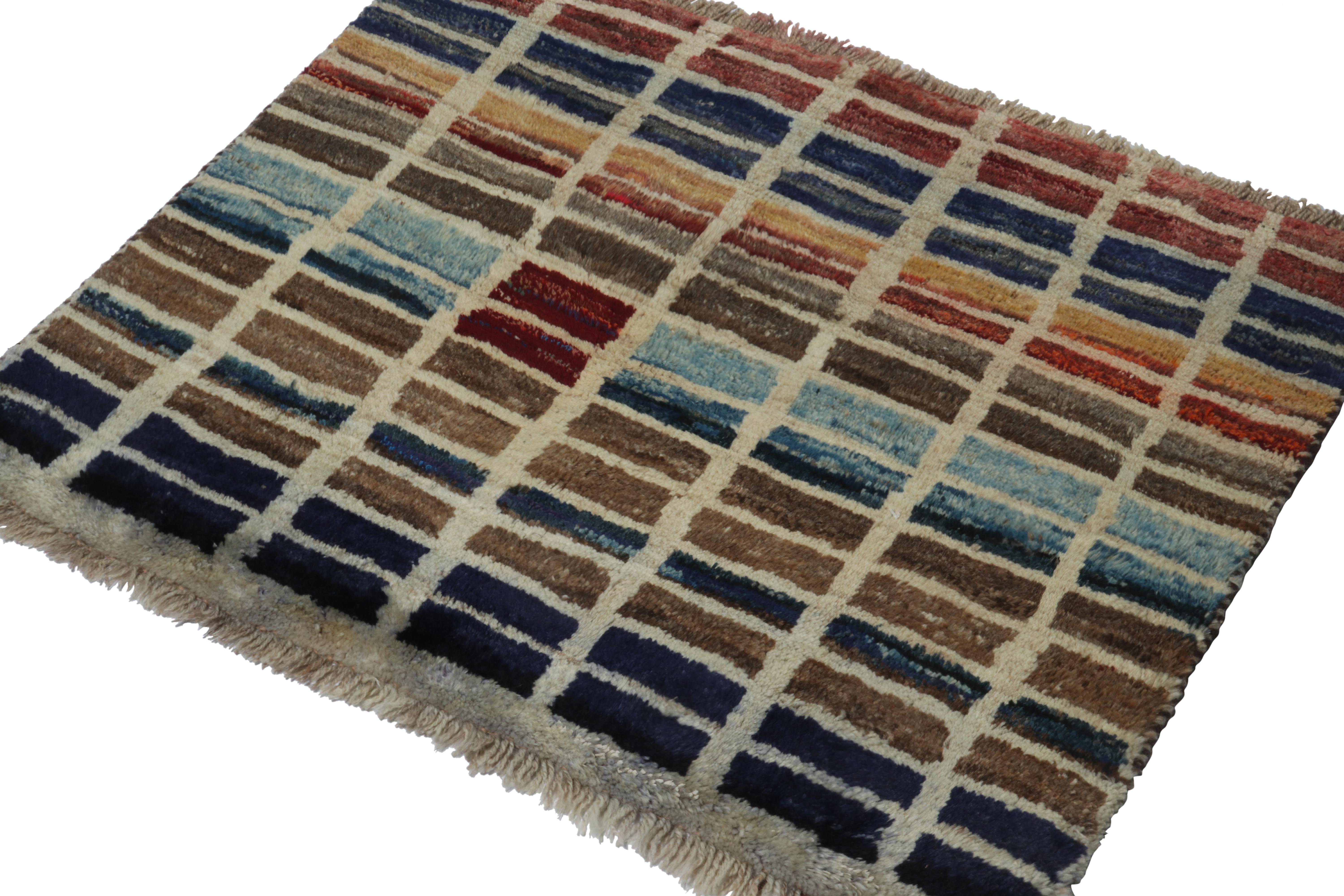 A vintage 3x3 Persian Gabbeh rug in the newest grand entry to Rug & Kilim’s curation of rare tribal pieces. Hand-knotted in wool circa 1950-1960.

On the Design:

This piece enjoys a grid-like geometric pattern, with playful tones of blue, and