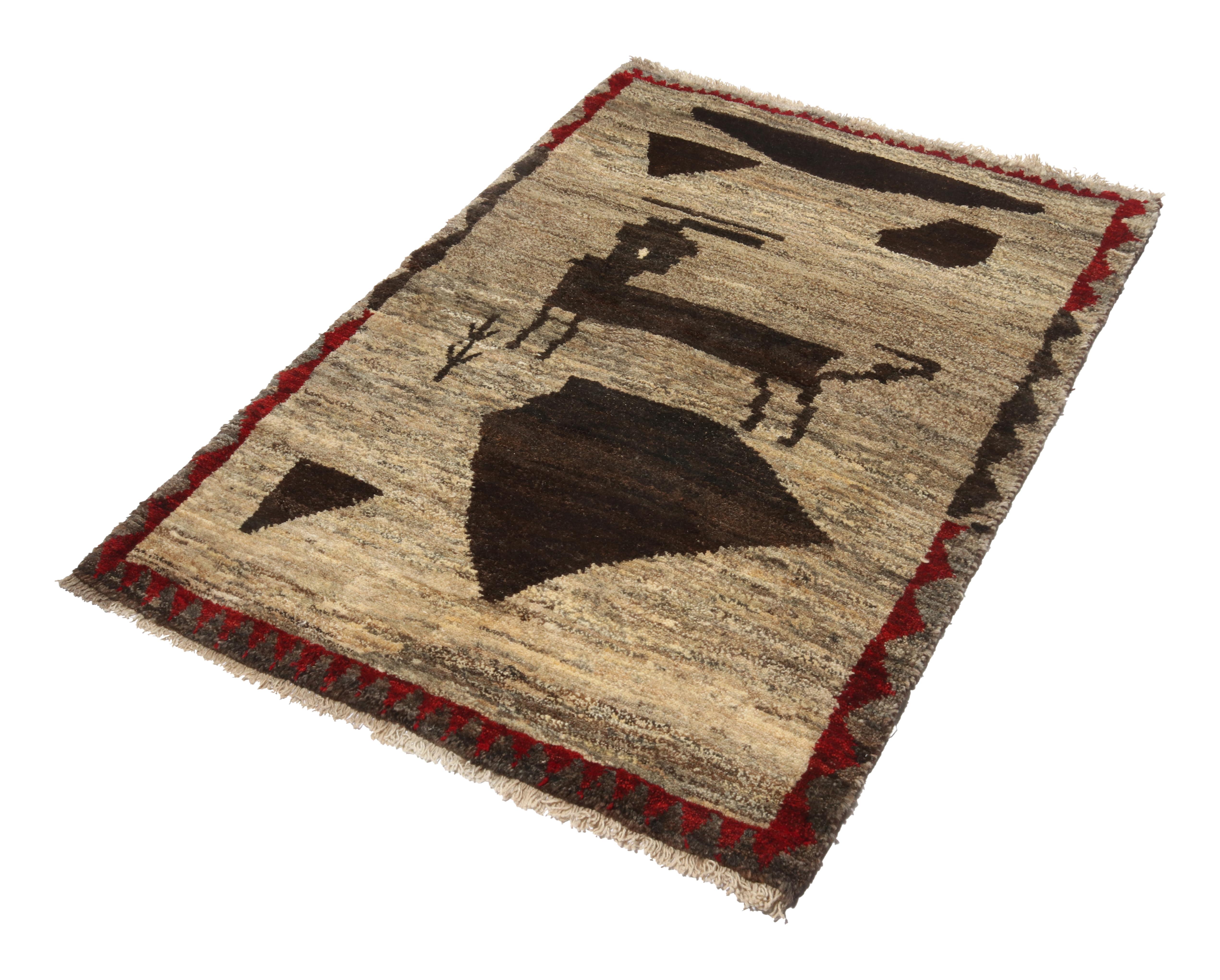 A vintage 3x5 Gabbeh rug, among the latest additions to Rug & Kilim’s newest curation of rare Persian tribal pieces. Hand-knotted in wool circa 1950-1960.

On the design:

This mid-century piece features a minimalist animal pictorial in rich