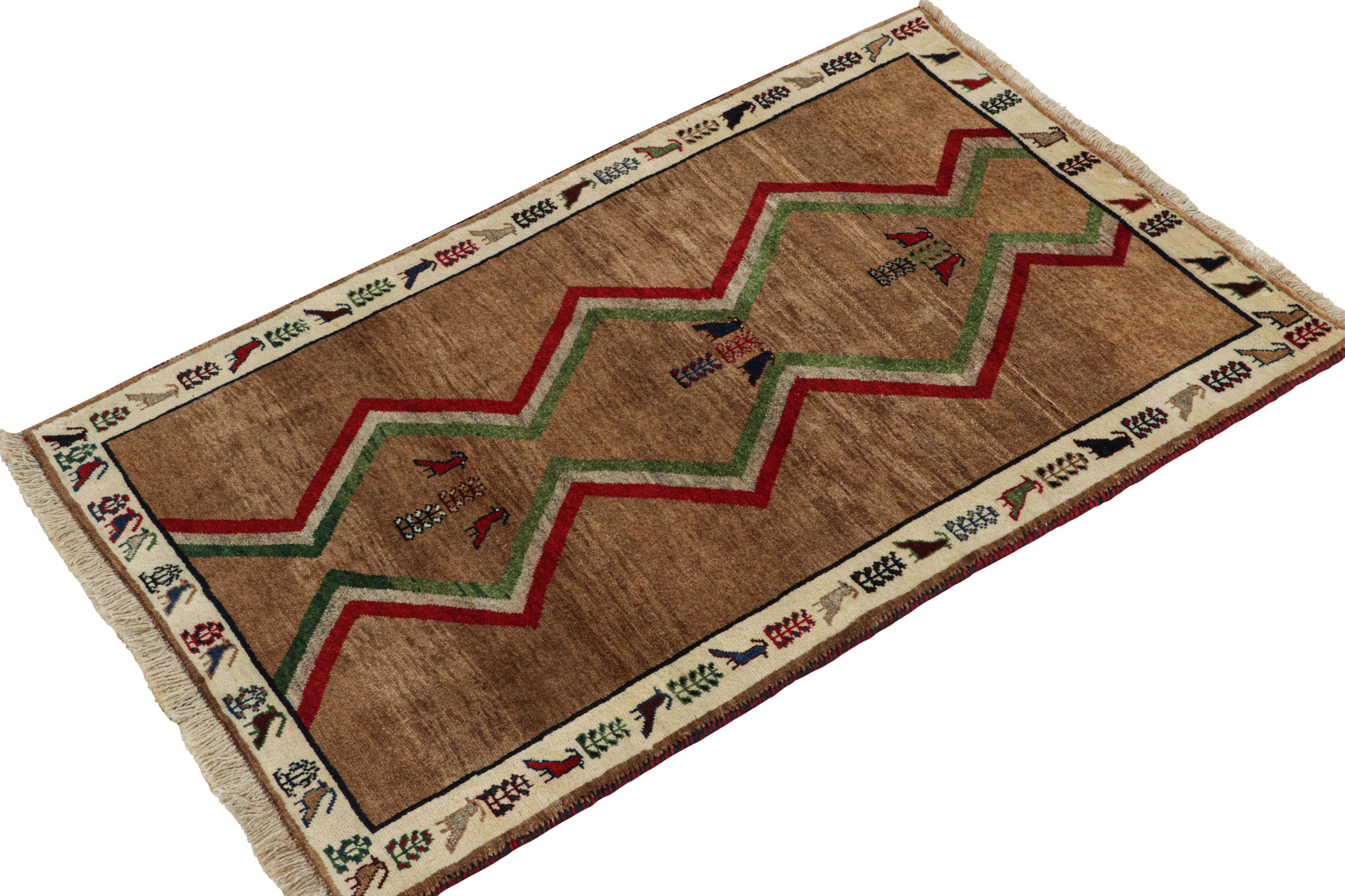 This vintage 4x6 Gabbeh Persian rug is from the latest entries in Rug & Kilim’s rare tribal curations. Hand-knotted in wool circa 1950-1960.

On the Design:

This tribal provenance is one of the most primitive, and collectible shabby-chic styles