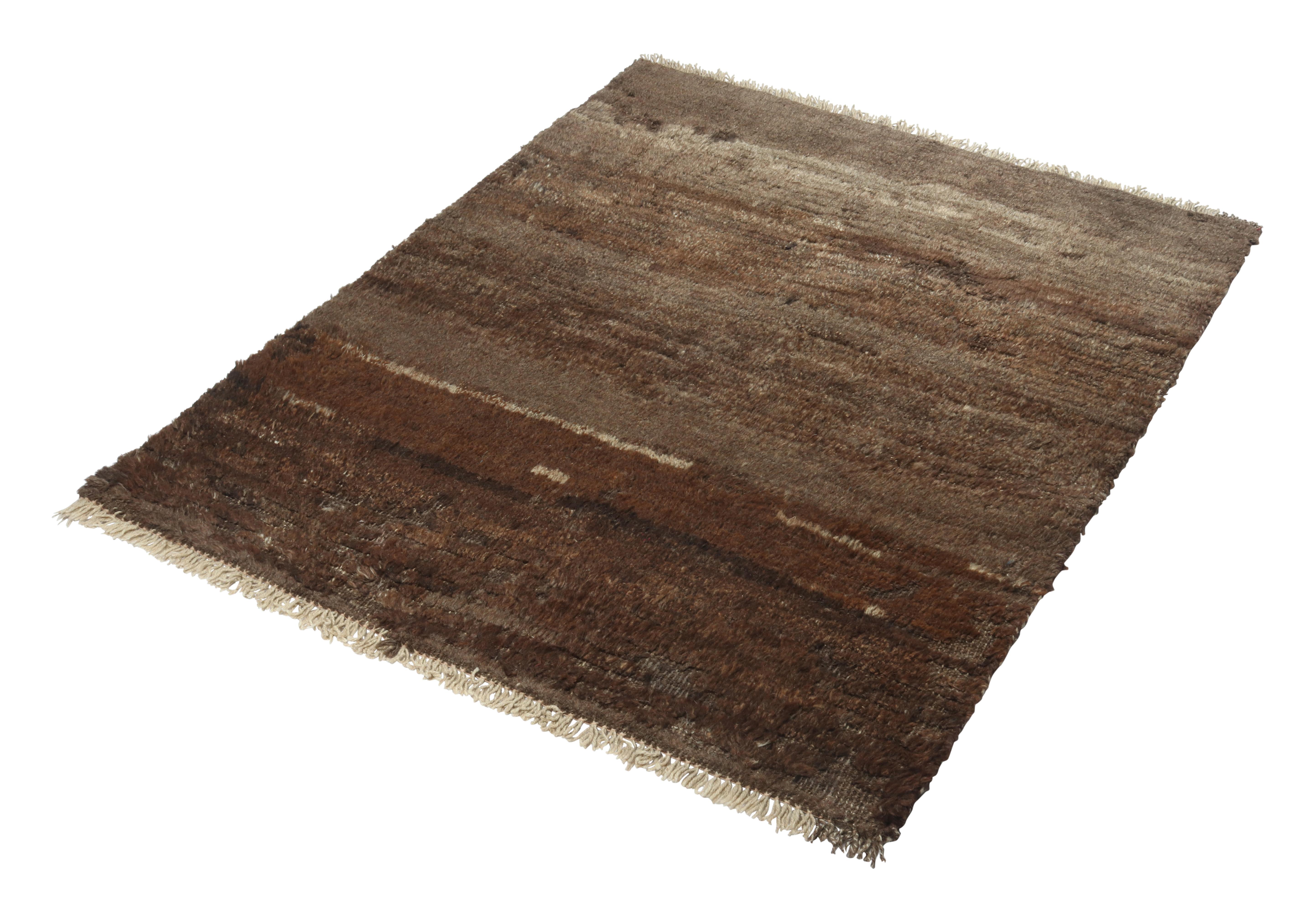 A vintage 3x4 Persian Gabbeh rug of rich entry to Rug & Kilim’s newest curation of rare tribal pieces. Hand-knotted in wool circa 1950-1960.

On the design: 

This mid-century piece enjoys a handsome play of deep brown and beige notes in a