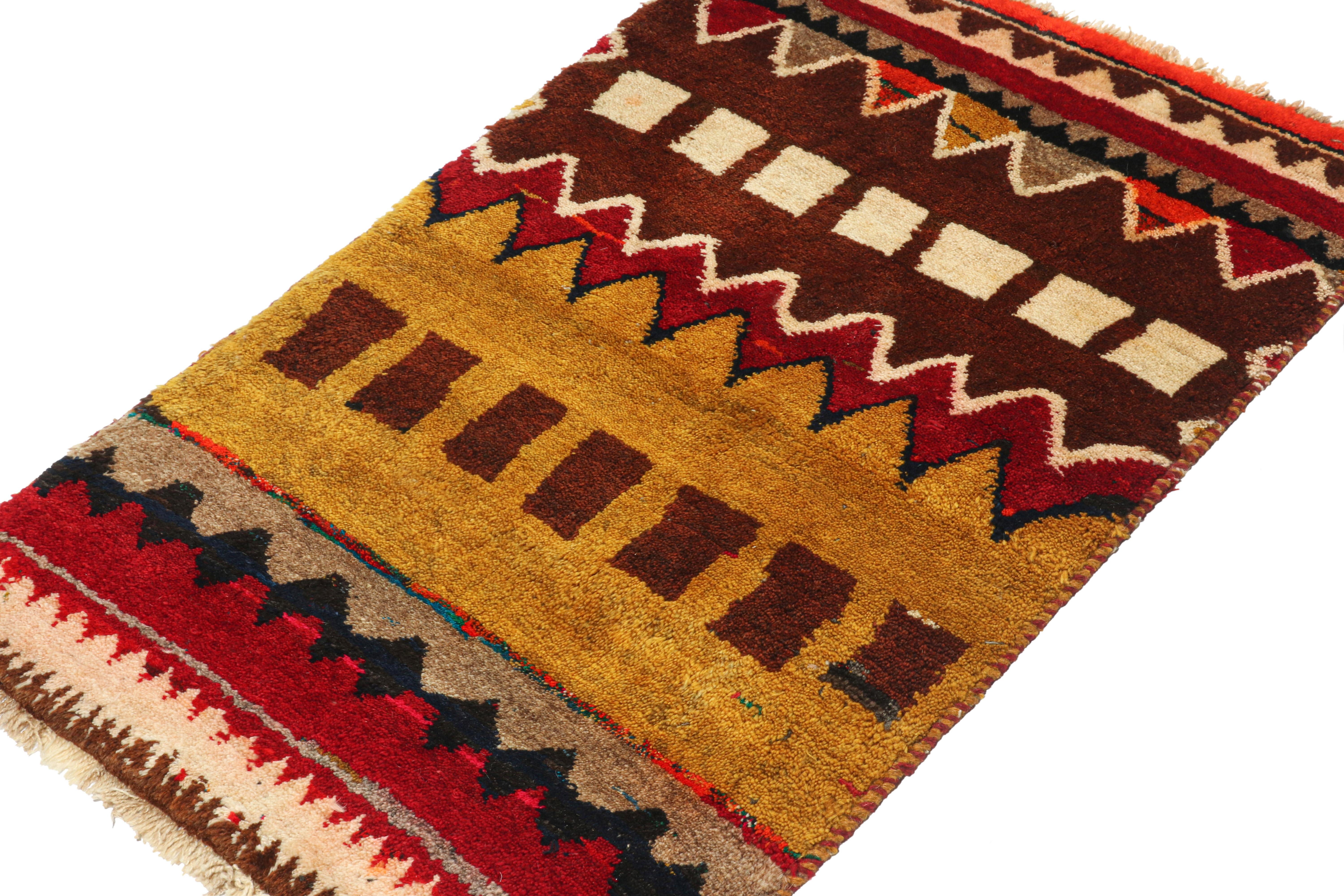 A vintage 2x4 Persian Gabbeh runner, from a grand entry to Rug & Kilim’s curation of rare tribal pieces. Hand-knotted in wool circa 1950-1960. 

On the Design: 

This mid-century piece features a series of chevrons and geometric patterns in