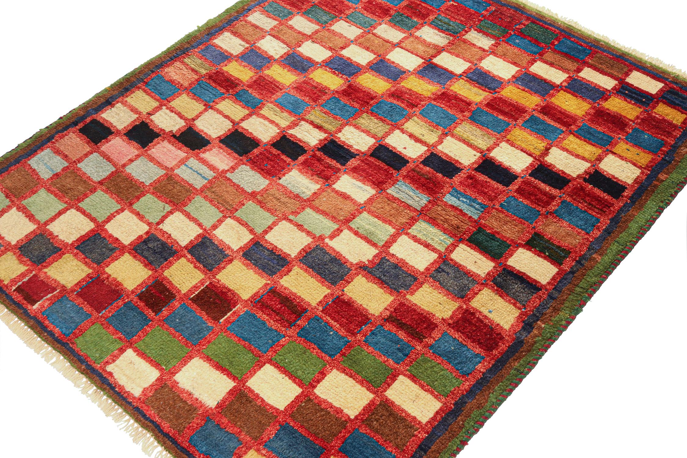 This vintage 4x5 Persian Gabbeh rug makes a splendid entry to Rug & Kilim’s curation of rare tribal pieces. Hand-knotted in wool circa 1950-1960.

On the Design:

The piece features a playful geometric pattern in a joyful range of beige-brown,