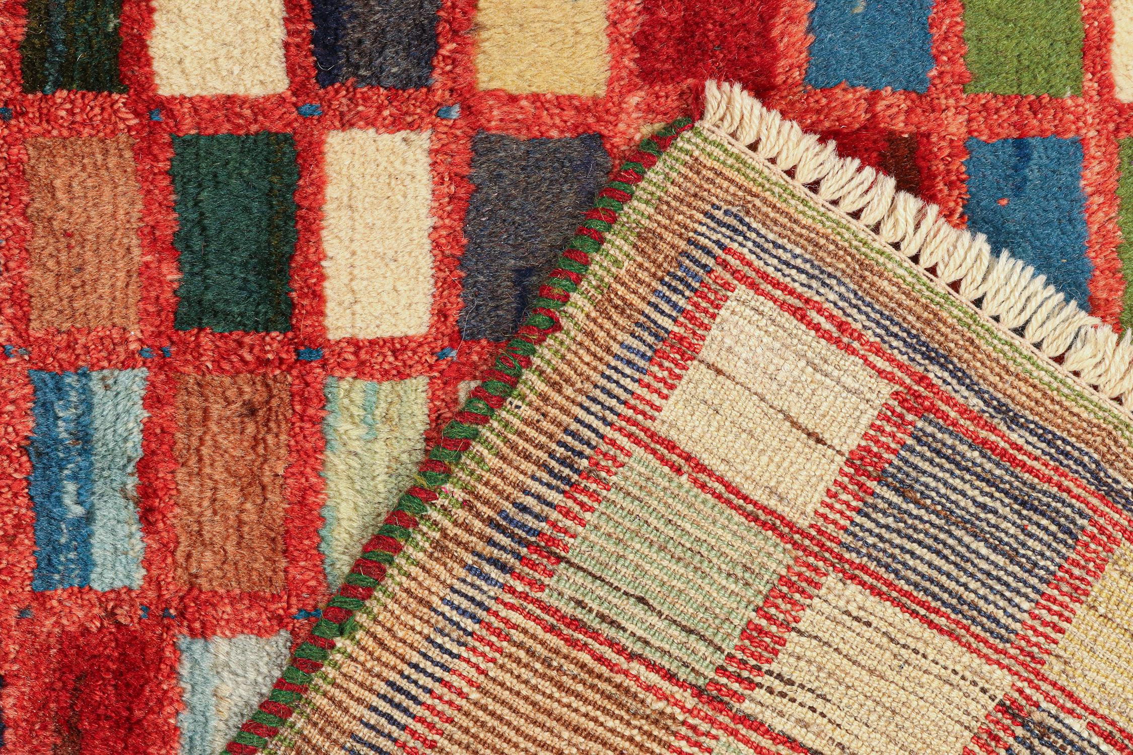 Wool Vintage Gabbeh Tribal Rug in Polychromatic Geometric Pattern by Rug & Kilim For Sale
