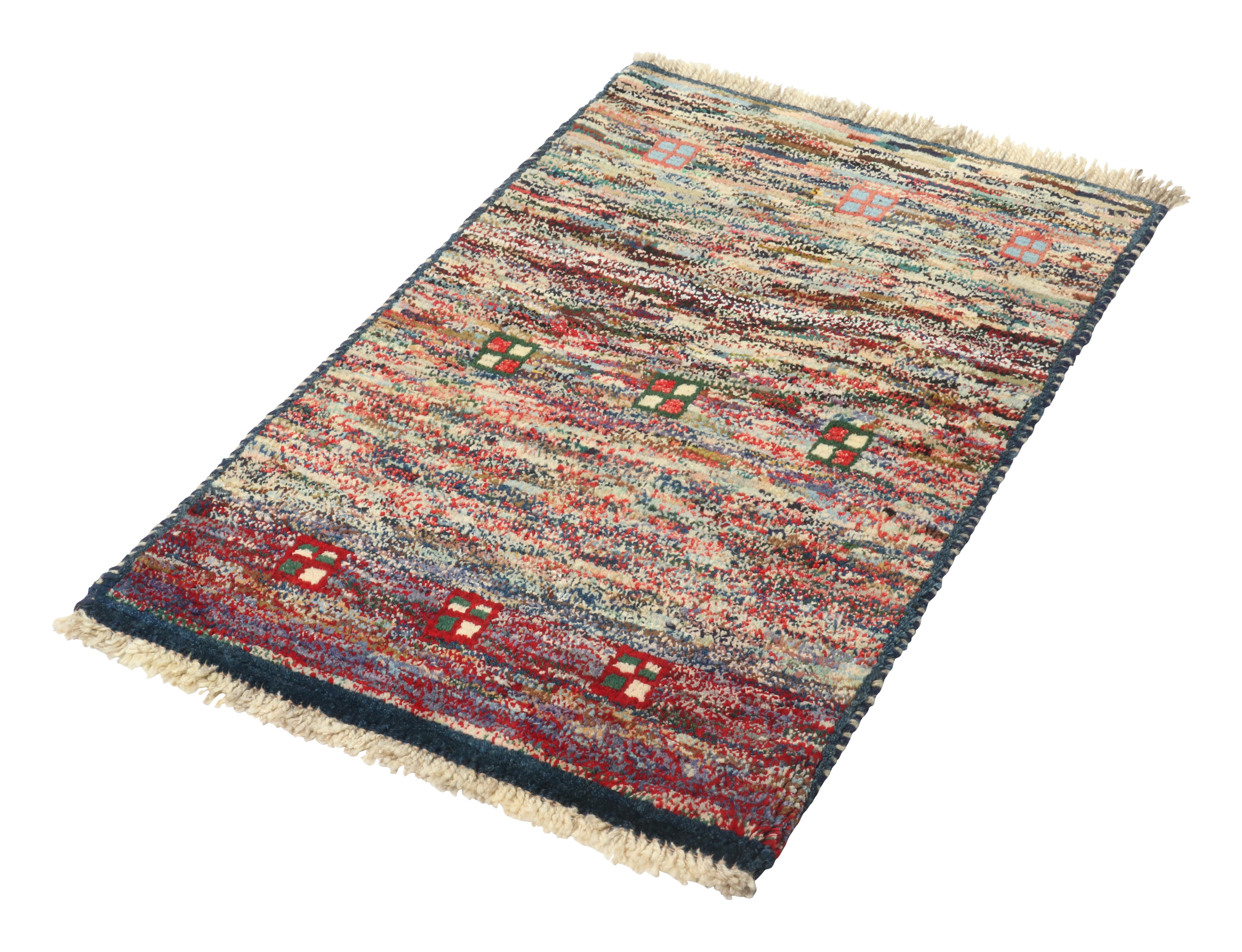 A vintage 2x3 Persian Gabbeh rug from Rug & Kilim’s newest curation of rare tribal pieces. Hand-knotted in wool circa 1950-1960.

On the design: 

This mid-century piece enjoys a gorgeous play of polychromatic tones sometimes seen in this