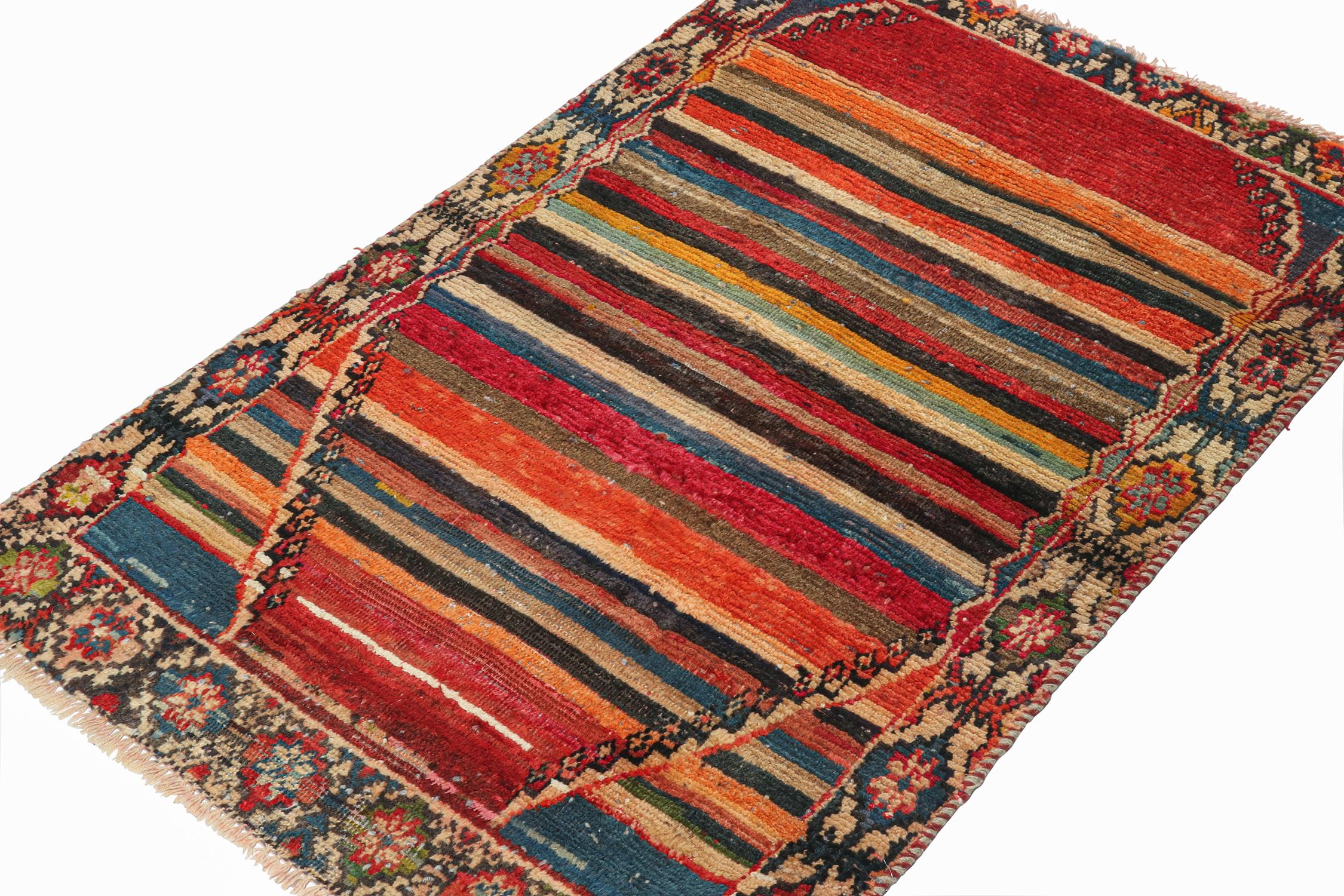 A vintage 3x4 Persian Gabbeh rug, from a grand new entry in Rug & Kilim’s curation of rare tribal pieces. Hand-knotted in wool circa 1950-1960. 

On the design: 

The piece enjoys a most unusual marriage of tribal geometric border and a