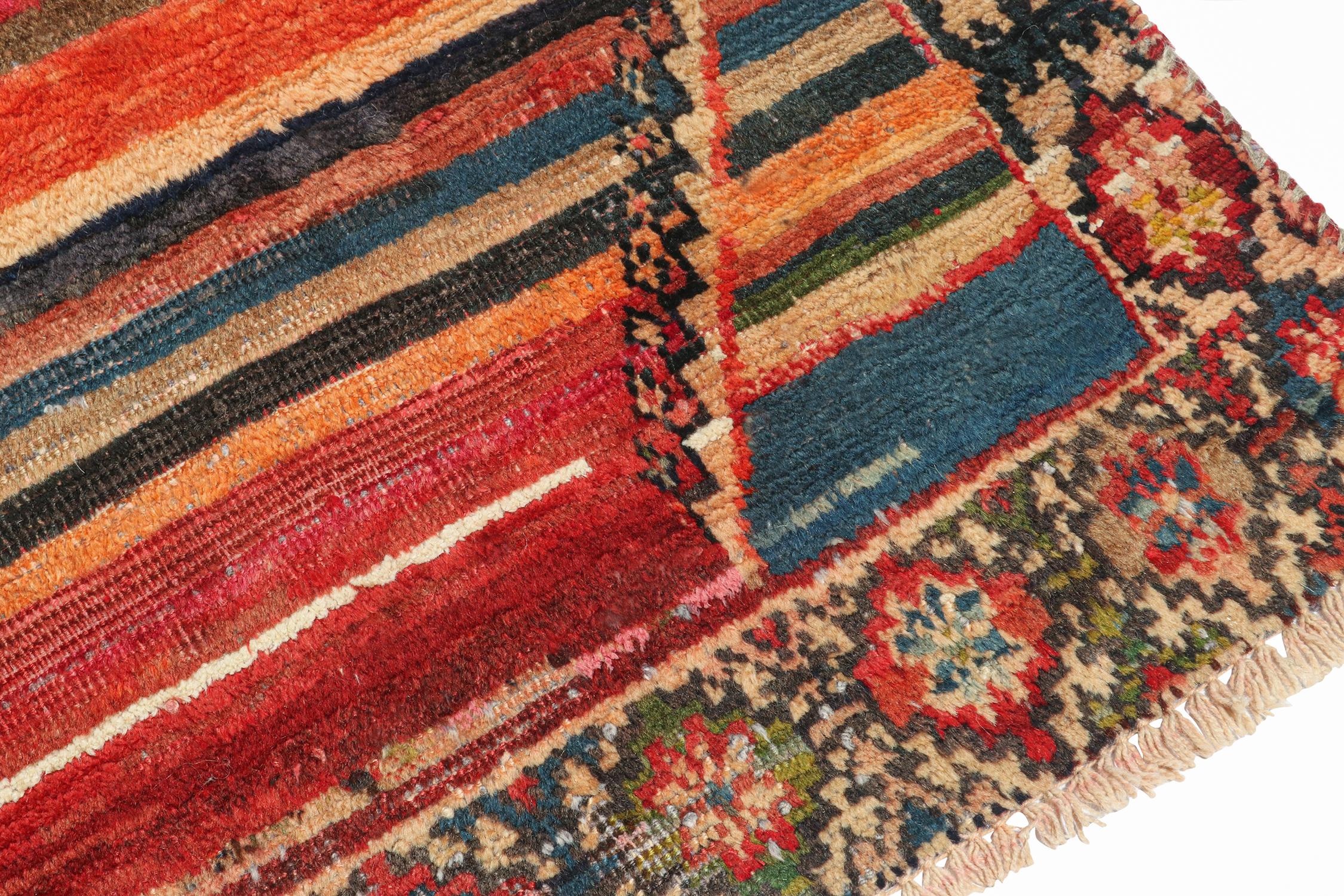 Vintage Gabbeh Tribal Rug in Polychromatic Stripes Patterns by Rug & Kilim In Good Condition For Sale In Long Island City, NY