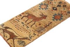 Vintage Gabbeh Tribal runner in Beige-Brown Deer Pictorial by Rug & Kilim