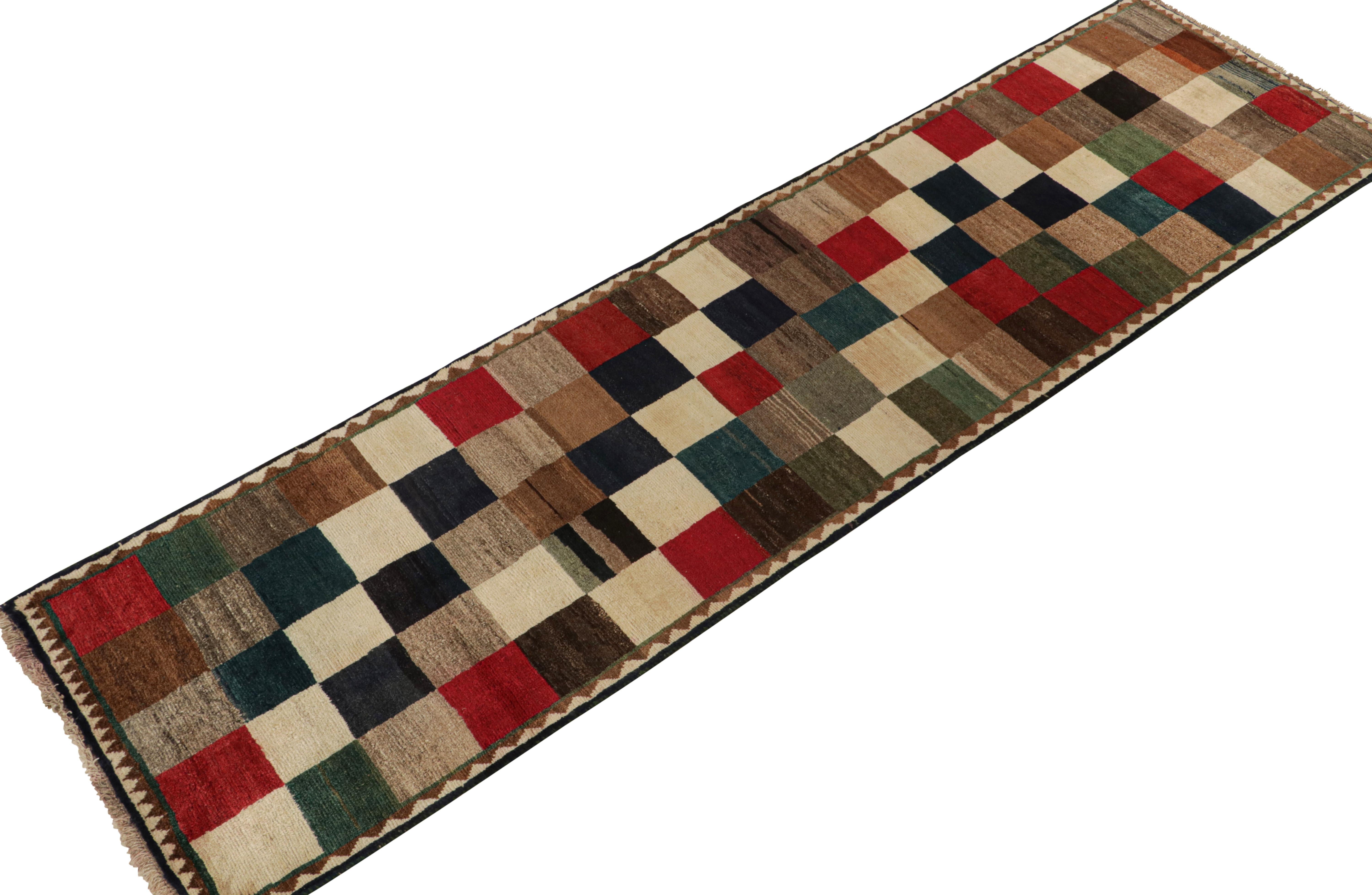 This vintage 3x11 Gabbeh Persian rug is from the latest entries in Rug & Kilim’s rare tribal curations. Hand-knotted in wool circa 1950-1960.
On the Design:
This tribal provenance is one of the most primitive, and collectible shabby-chic styles in