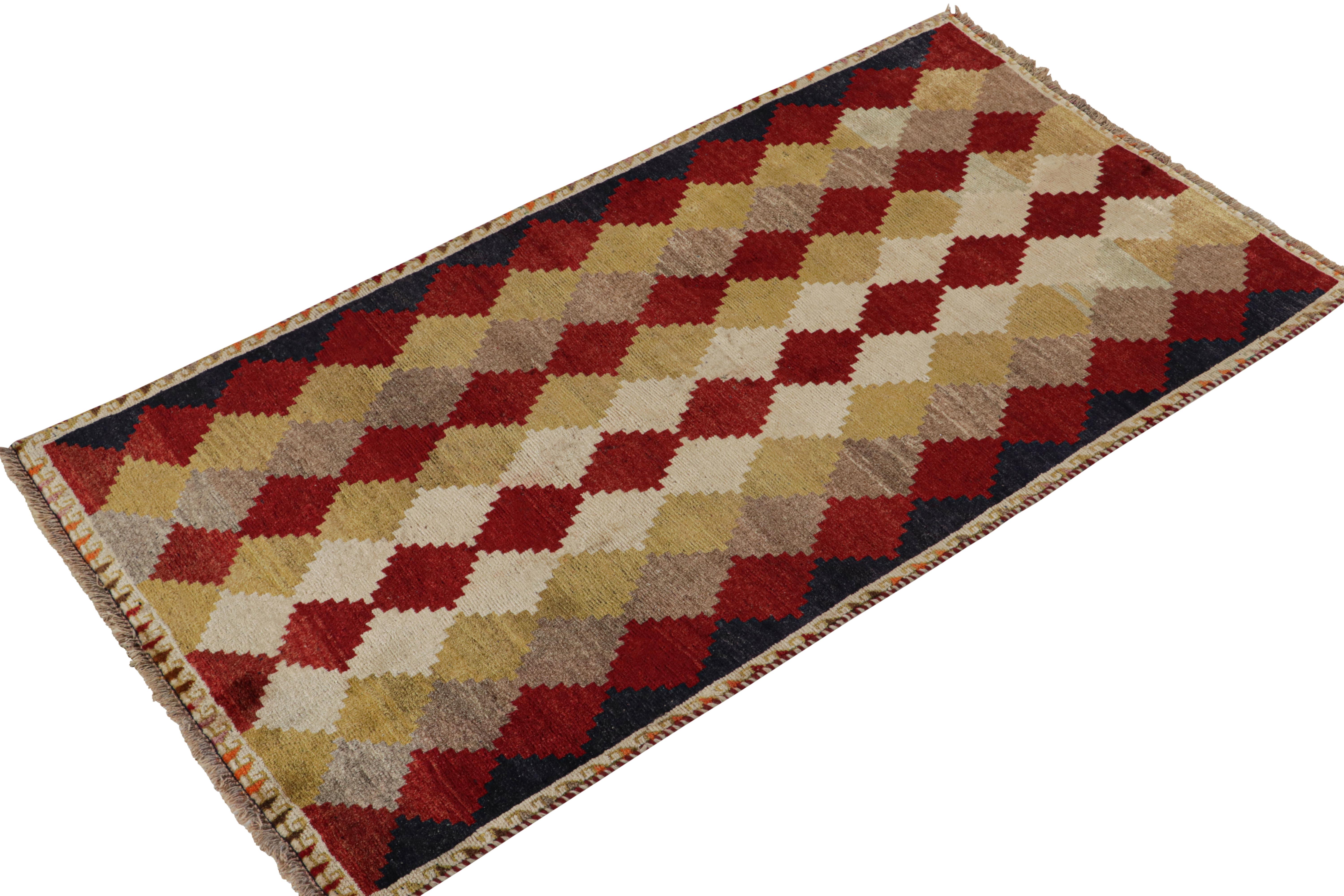This vintage 3x6 Gabbeh Persian rug is from the latest entries in Rug & Kilim’s rare tribal curations. Hand-knotted in wool circa 1950-1960.

On the Design:

This tribal provenance is one of the most primitive, and collectible shabby-chic styles