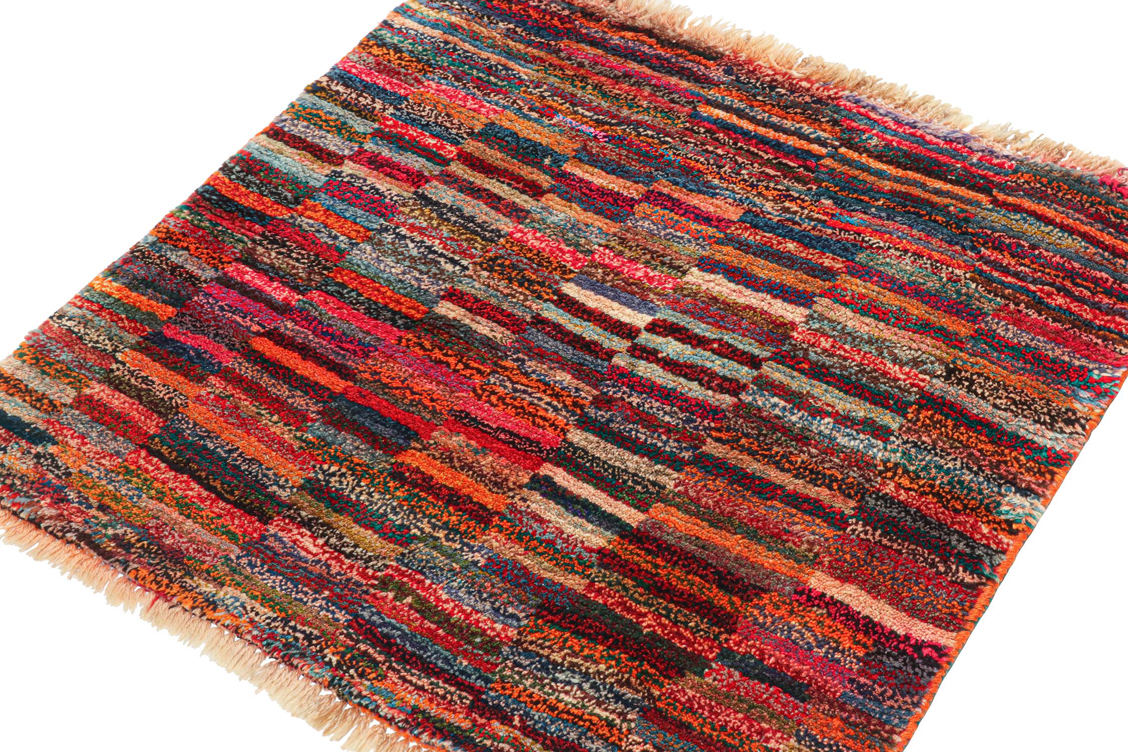 A vintage 2x2 Persian Gabbeh rug, from the latest grand entry in Rug & Kilim’s curation of rare tribal pieces. Hand-knotted in wool, originating circa 1950-1960.
On the Design:
This piece features a gorgeous play of polychromatic tones to