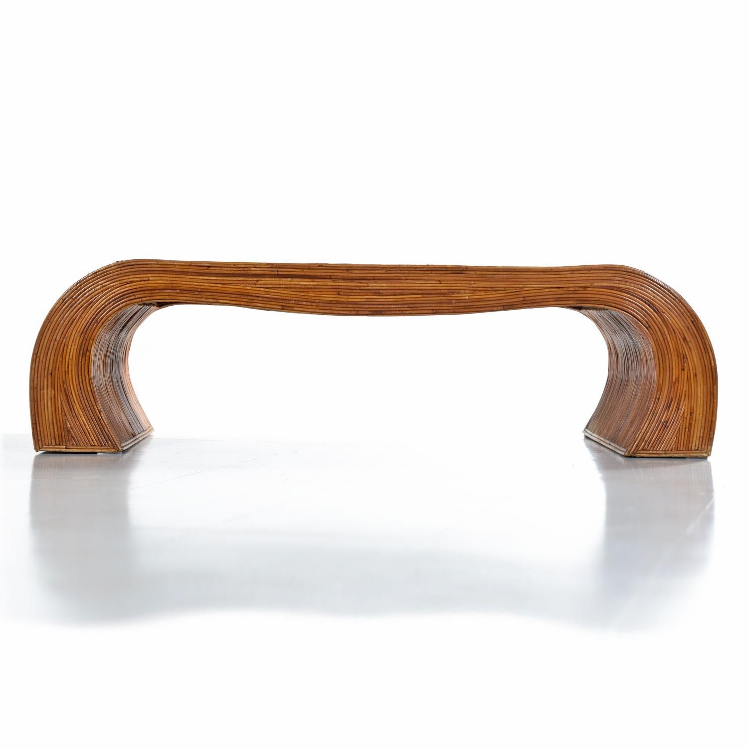 Monumental scale with the warmth of natural materials, this vintage Gabriella Crespi style pencil reed coffee table is the perfect focal point for your home. The earthy pencil reed motif is on trend, blending well with Bohemian, contemporary and