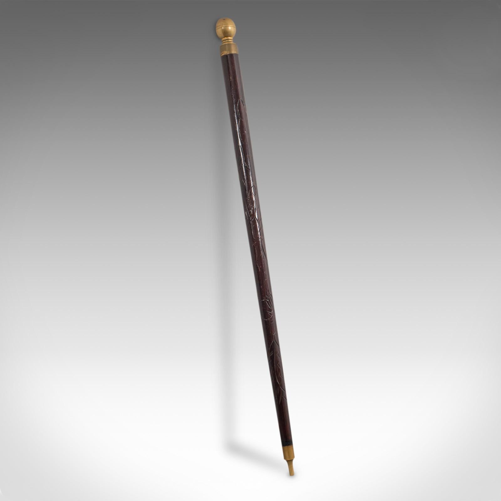 This is a fascinating vintage gadget cane. A Continental, hardwood walking stick with concealed full-size snooker cue, dating to the Art Deco period, circa 1940.

Walk masterfully up to a snooker table and delight the crowd with a hidden