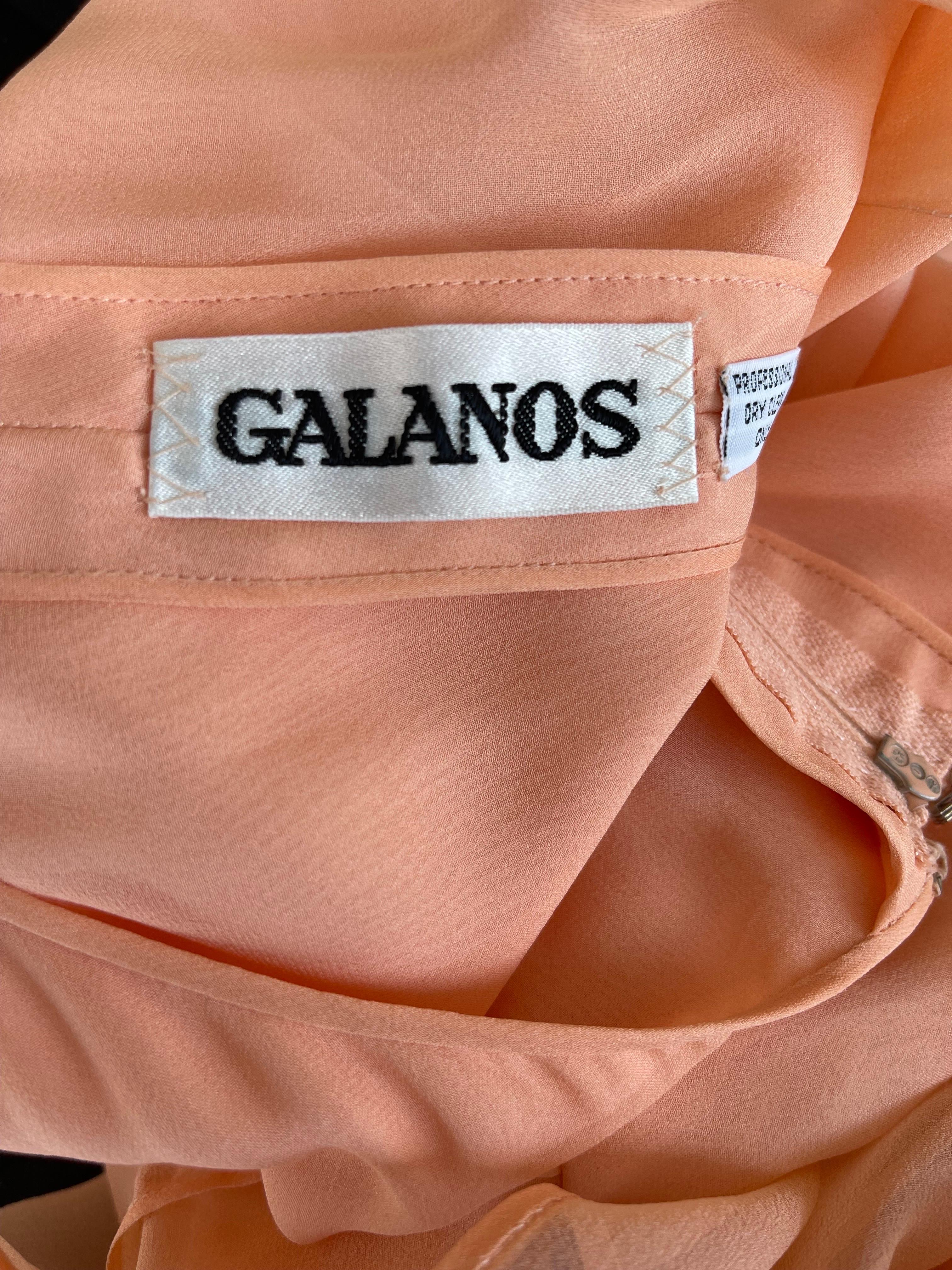 Rare early 80s JAMES GALANOS Couture peach / light pink salmon silk chiffon cut-out dress ! An insane amount of work went into the construction of this beauty. Tailored bodice with hidden zipper up the back. Sheer cut-out panels look fantastic with