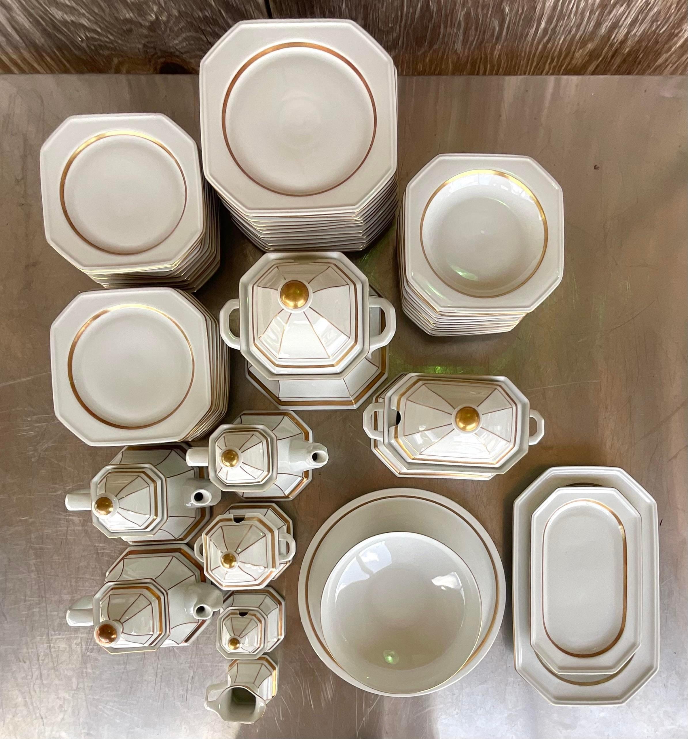 A fantastic vintage Boho set of Dinnerware. Made by the Gallo group in Germany. The Gallerie De Porcelaine “Lombardi Medici” design with a clean background and gold tipping. Signed on the bottom. A service for 12. Acquired from a Palm Beach