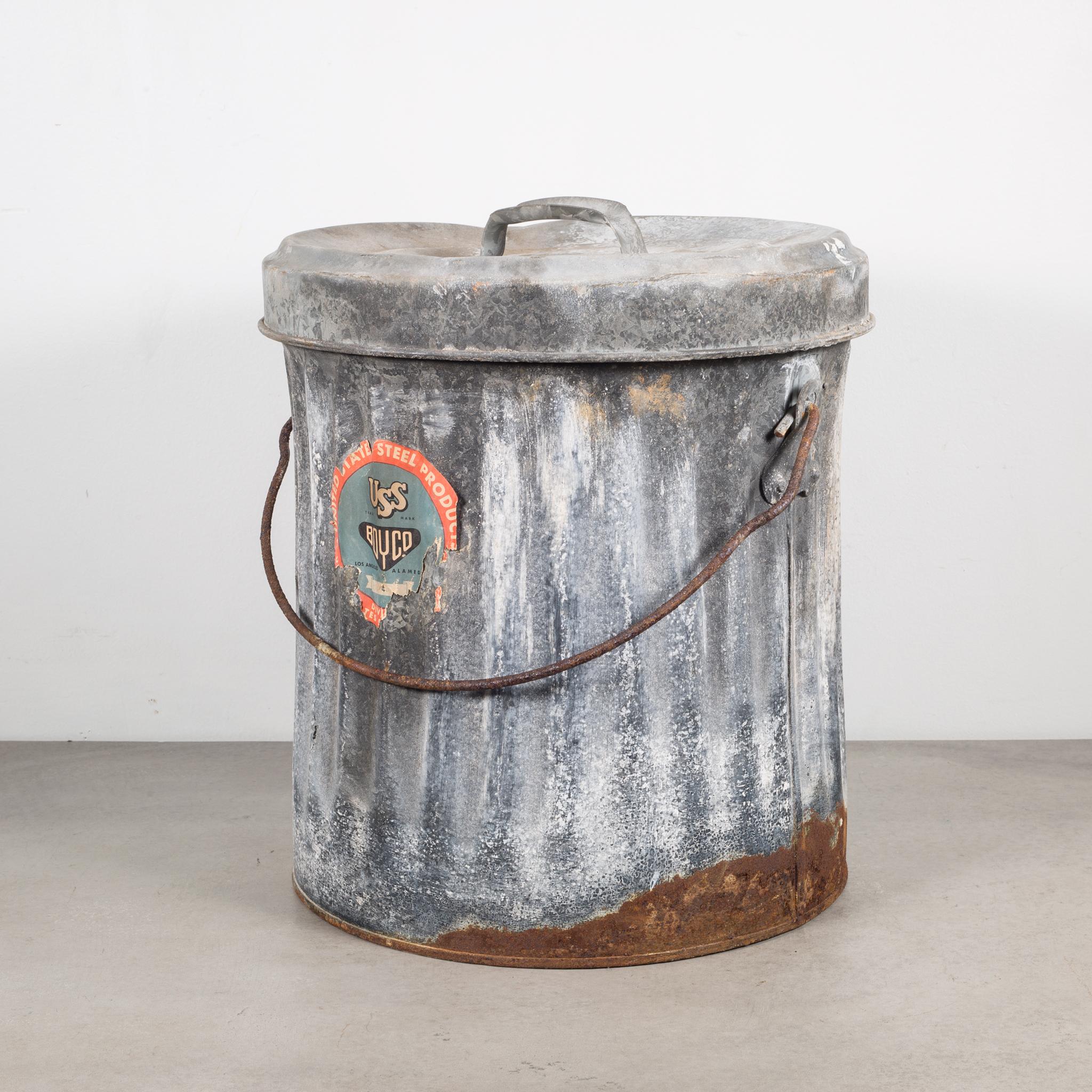 About

All original and intact early 20th century vintage industrial small wastecan with original handled lid. The robust waste can is comprised of heavy gauge galvanized steel with riveted joint reinforcement. It retains the original opposed bent