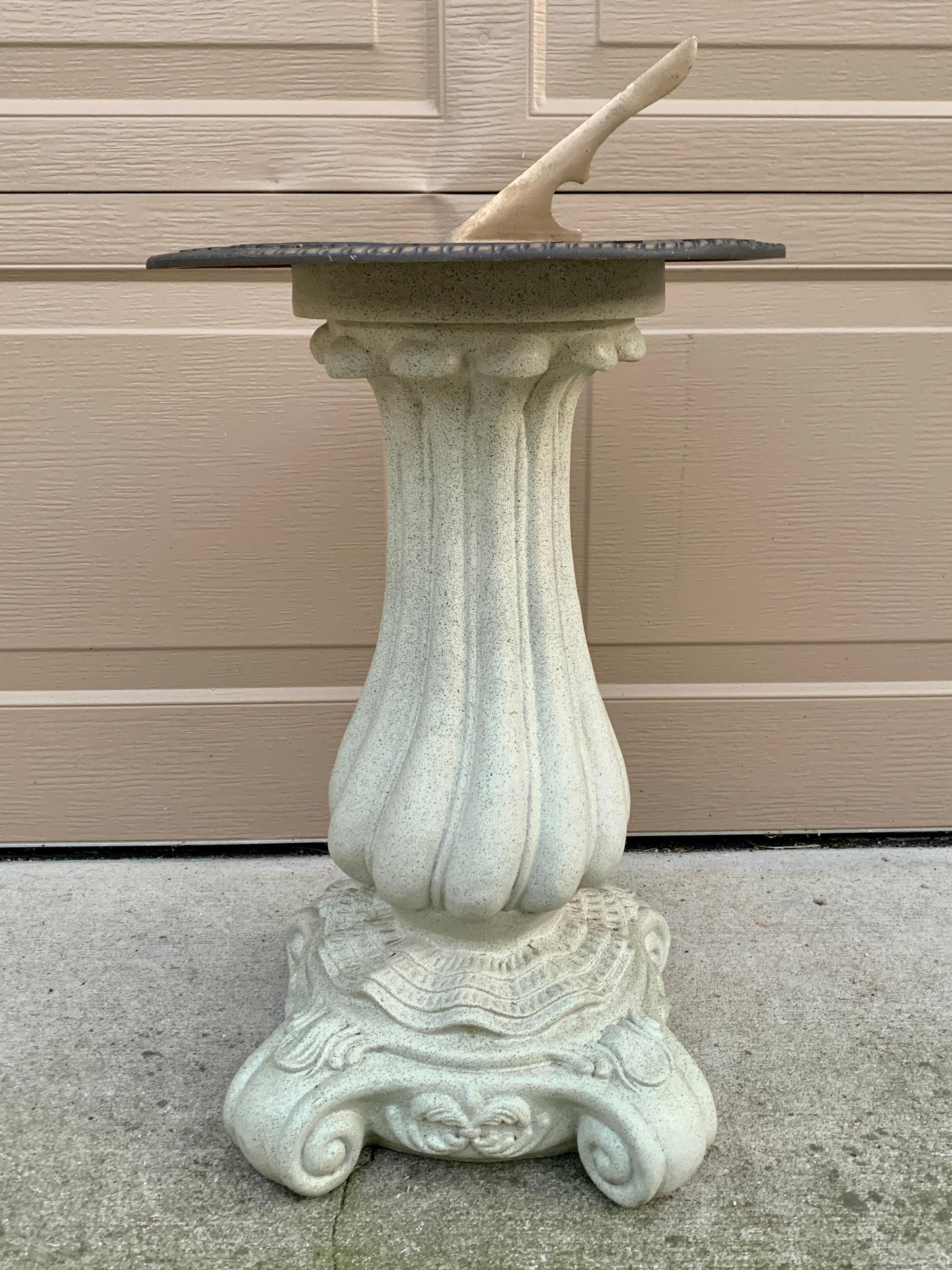 A stunning vintage garden sundial on column pedestal

USA, Late 20th Century

Metal armillary, atop cast resin pedestal

Measures: 14